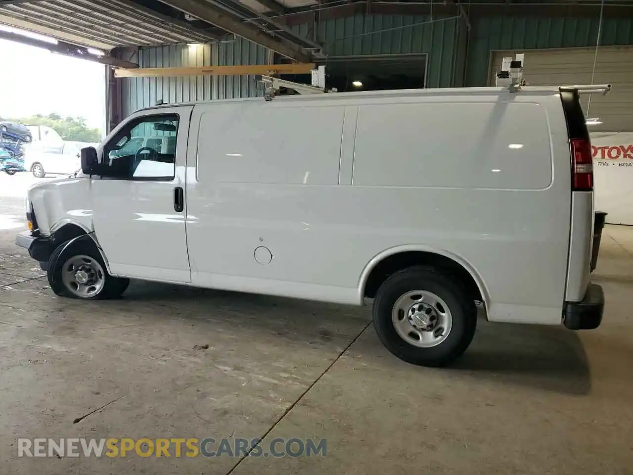 2 Photograph of a damaged car 1GCWGAFP2R1174904 CHEVROLET EXPRESS 2024