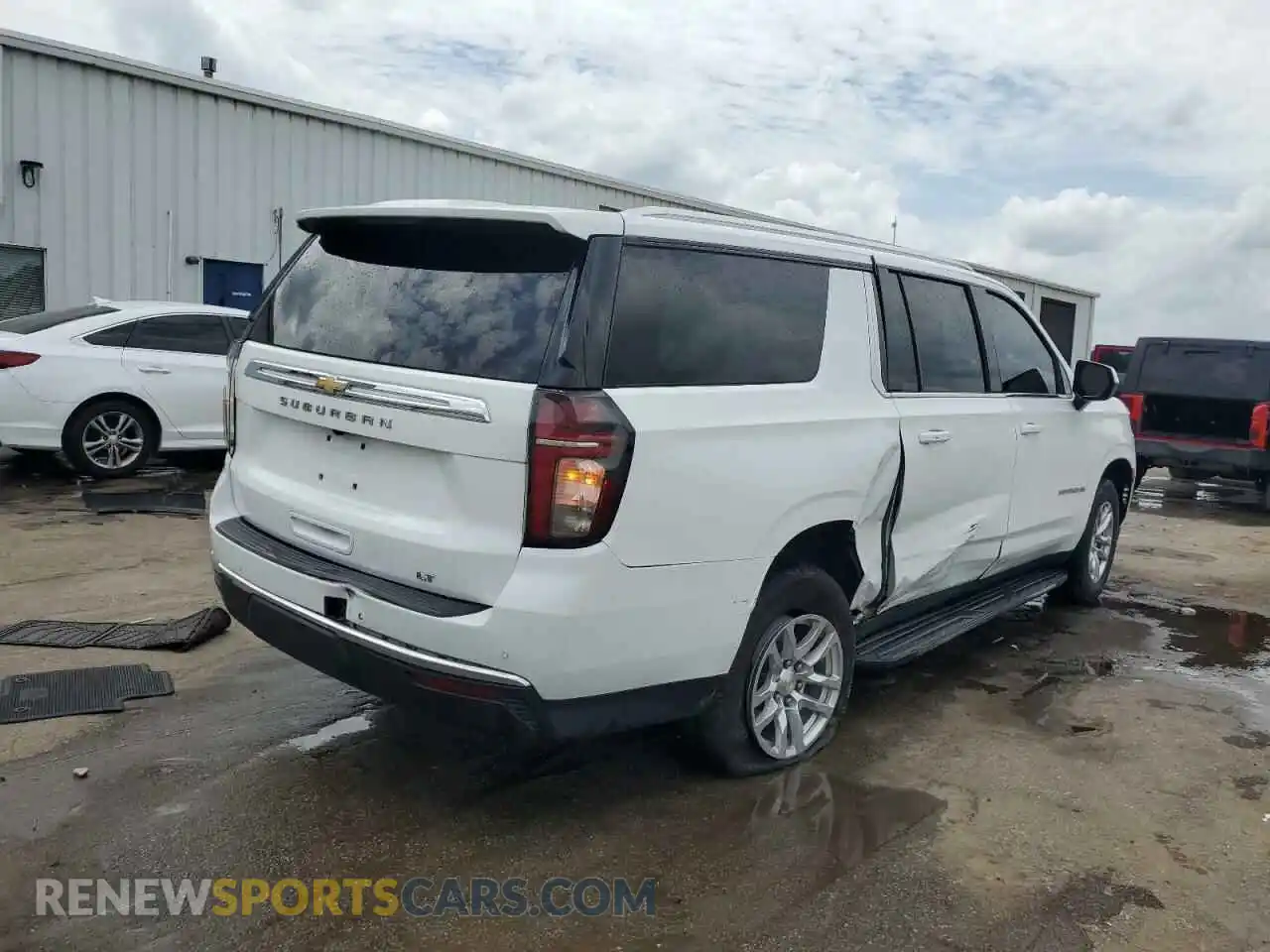 3 Photograph of a damaged car 1GNSCCKD2MR201909 CHEVROLET SUBURBAN 2021