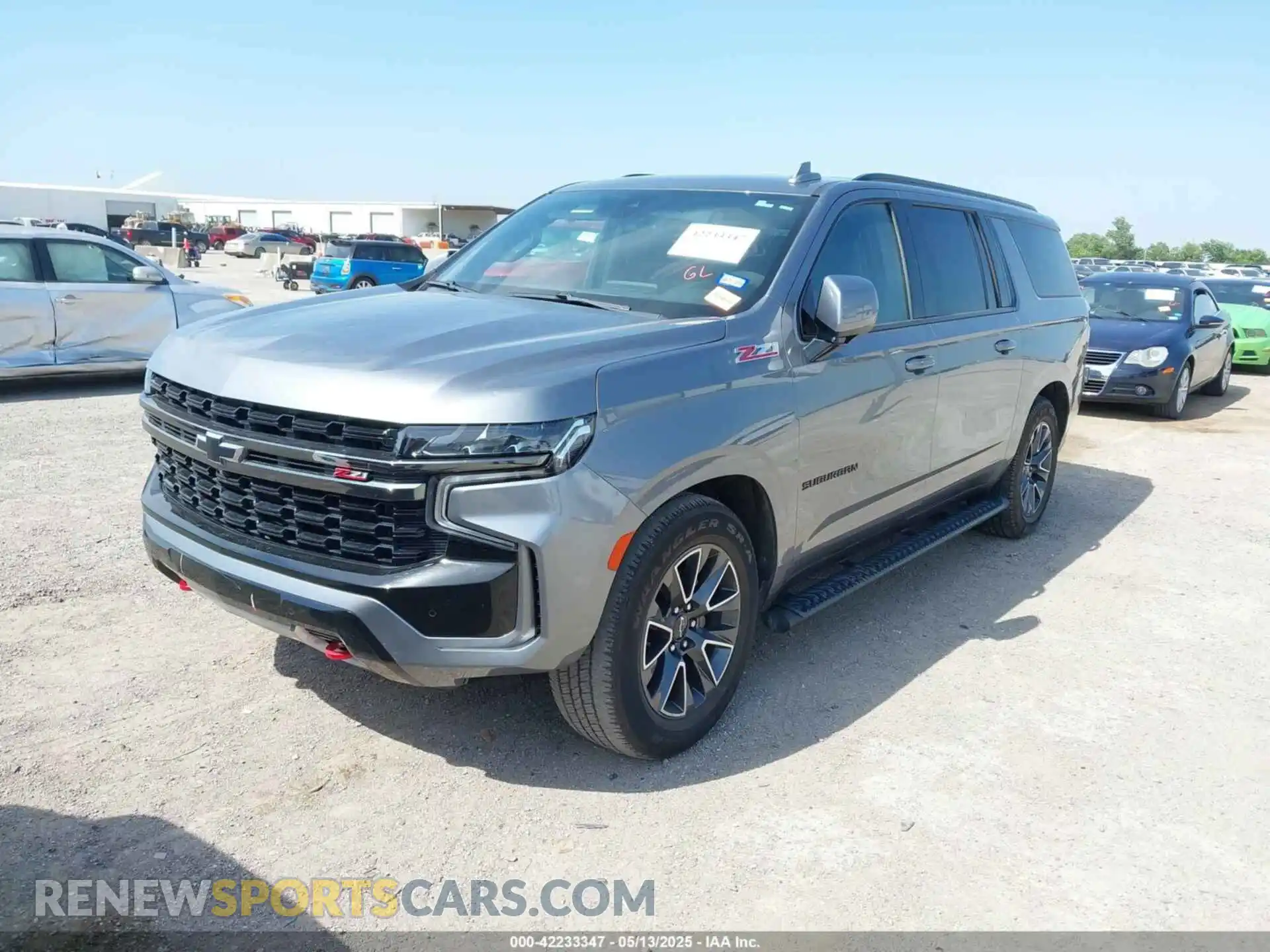 2 fotografías del automóvil dañado 1GNSKDKDXNR199045 CHEVROLET SUBURBAN 2022