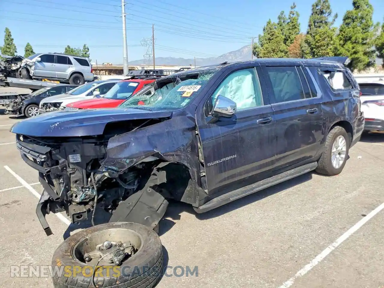 1 Photograph of a damaged car 1GNSCFKDXPR394624 CHEVROLET SUBURBAN 2023