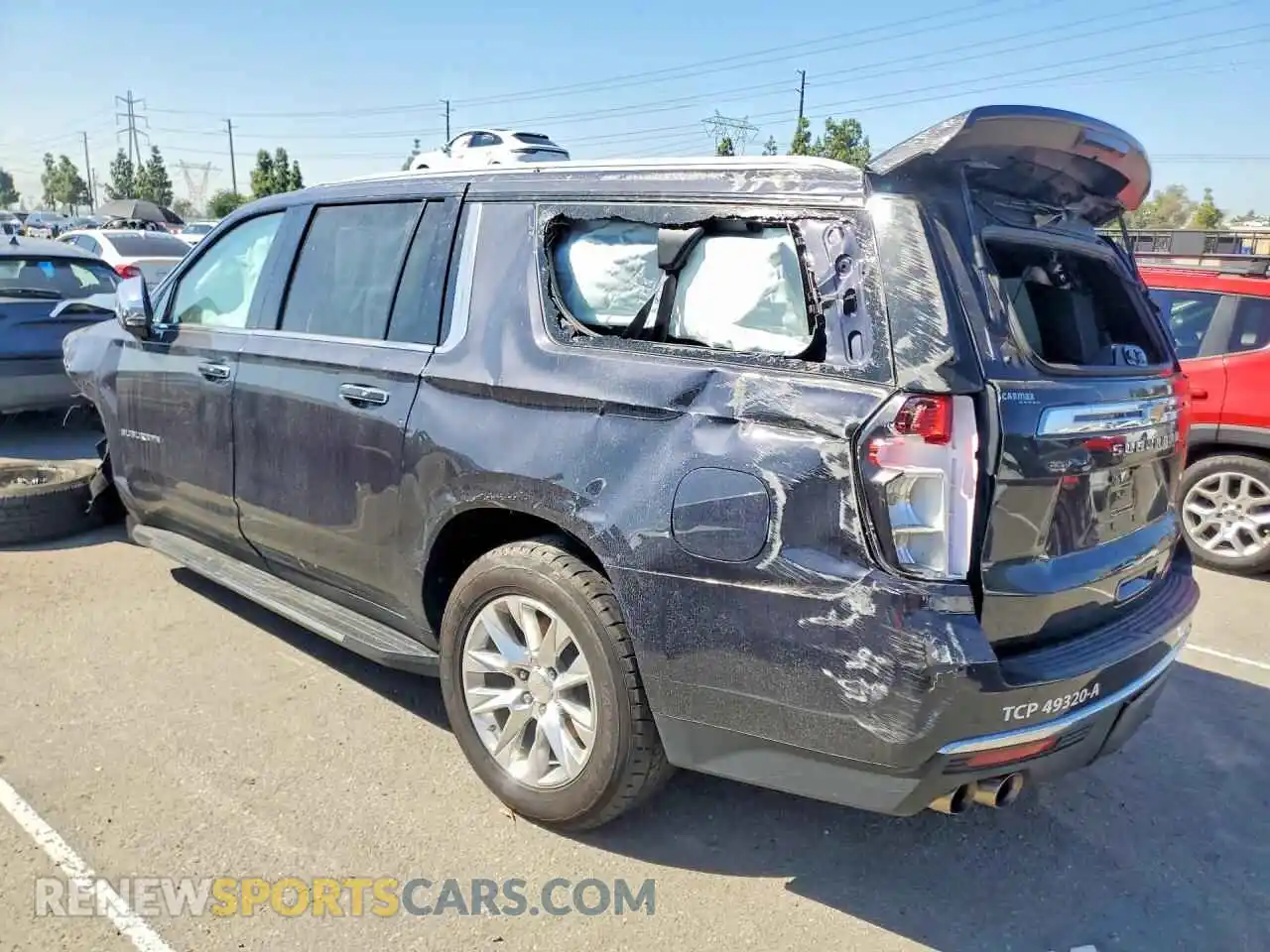 2 Photograph of a damaged car 1GNSCFKDXPR394624 CHEVROLET SUBURBAN 2023
