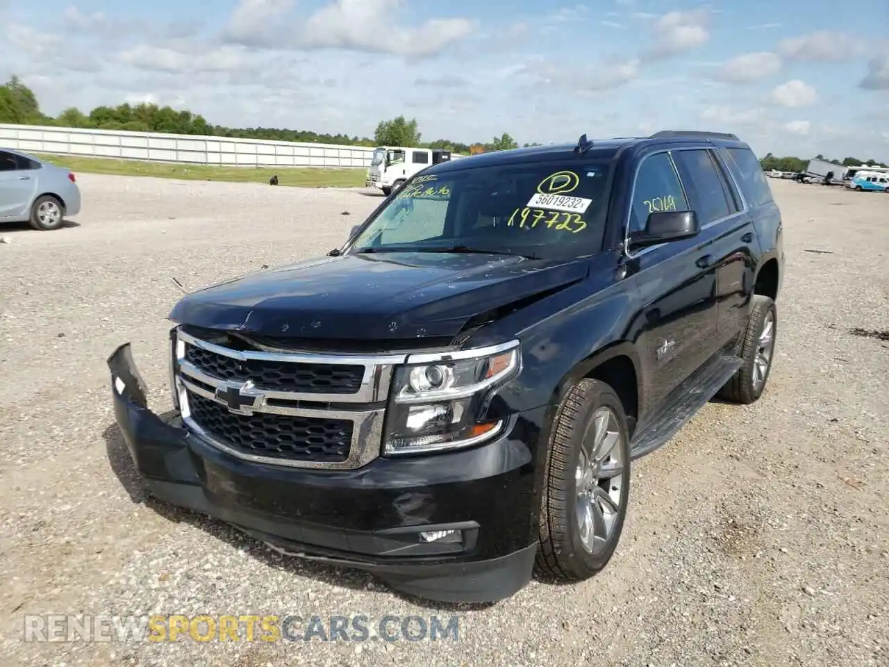 2 Photograph of a damaged car 1GNSCBKC1KR197723 CHEVROLET TAHOE 2019