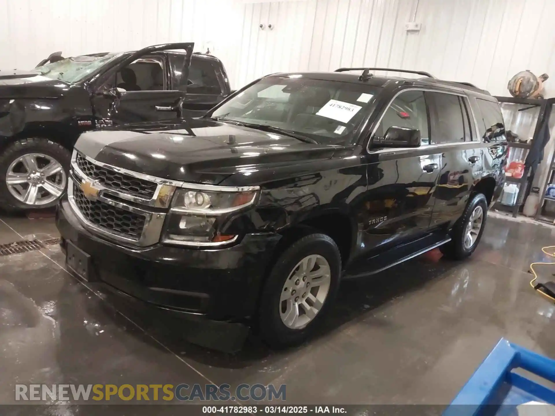 2 Photograph of a damaged car 1GNSKBKC2LR123473 CHEVROLET TAHOE 2020