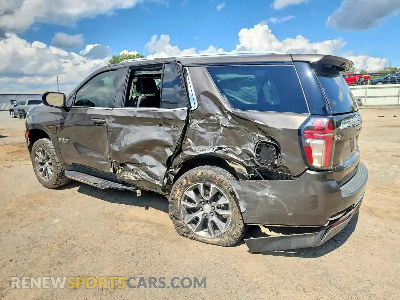 2 fotografías del automóvil dañado 1GNSCNKD2MR185061 CHEVROLET TAHOE 2021