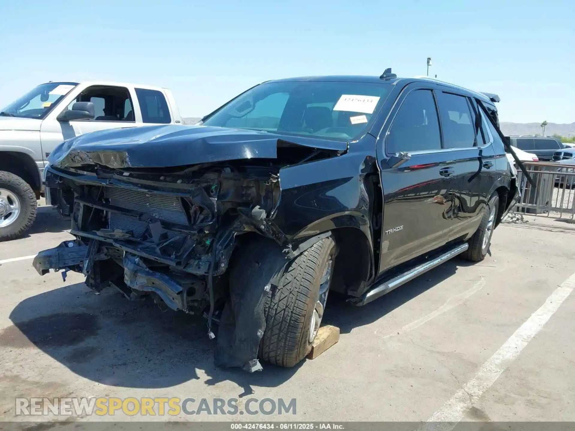 2 Photograph of a damaged car 1GNSCNKD5MR263476 CHEVROLET TAHOE 2021