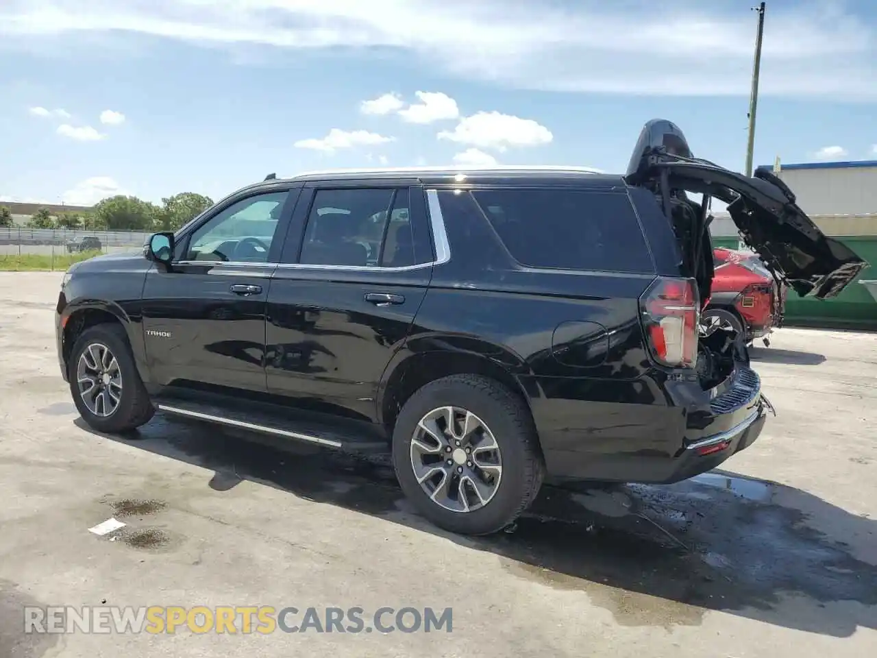 2 Photograph of a damaged car 1GNSCNKDXMR237553 CHEVROLET TAHOE 2021