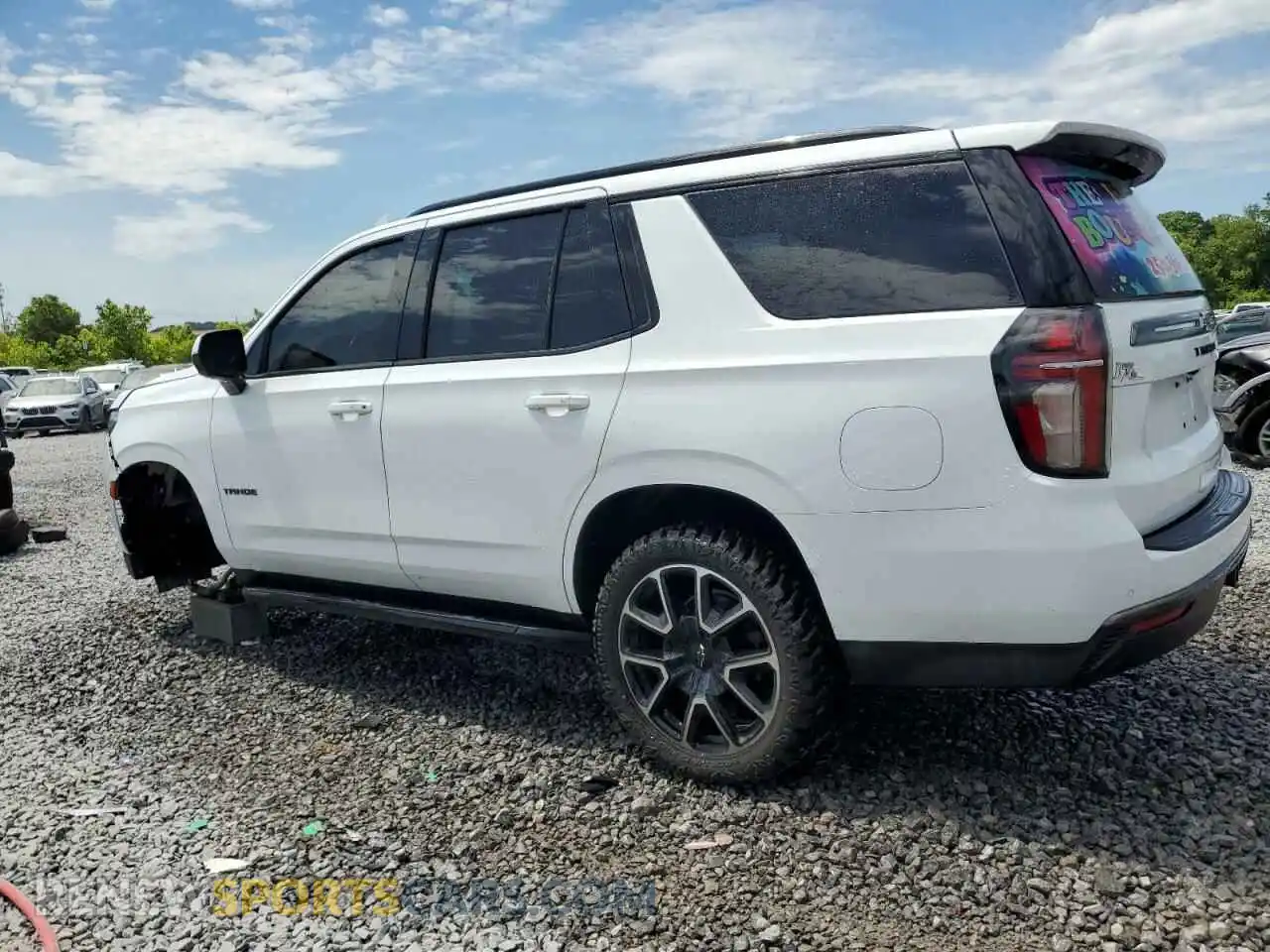 2 fotografías del automóvil dañado 1GNSCRKD9MR395972 CHEVROLET TAHOE 2021