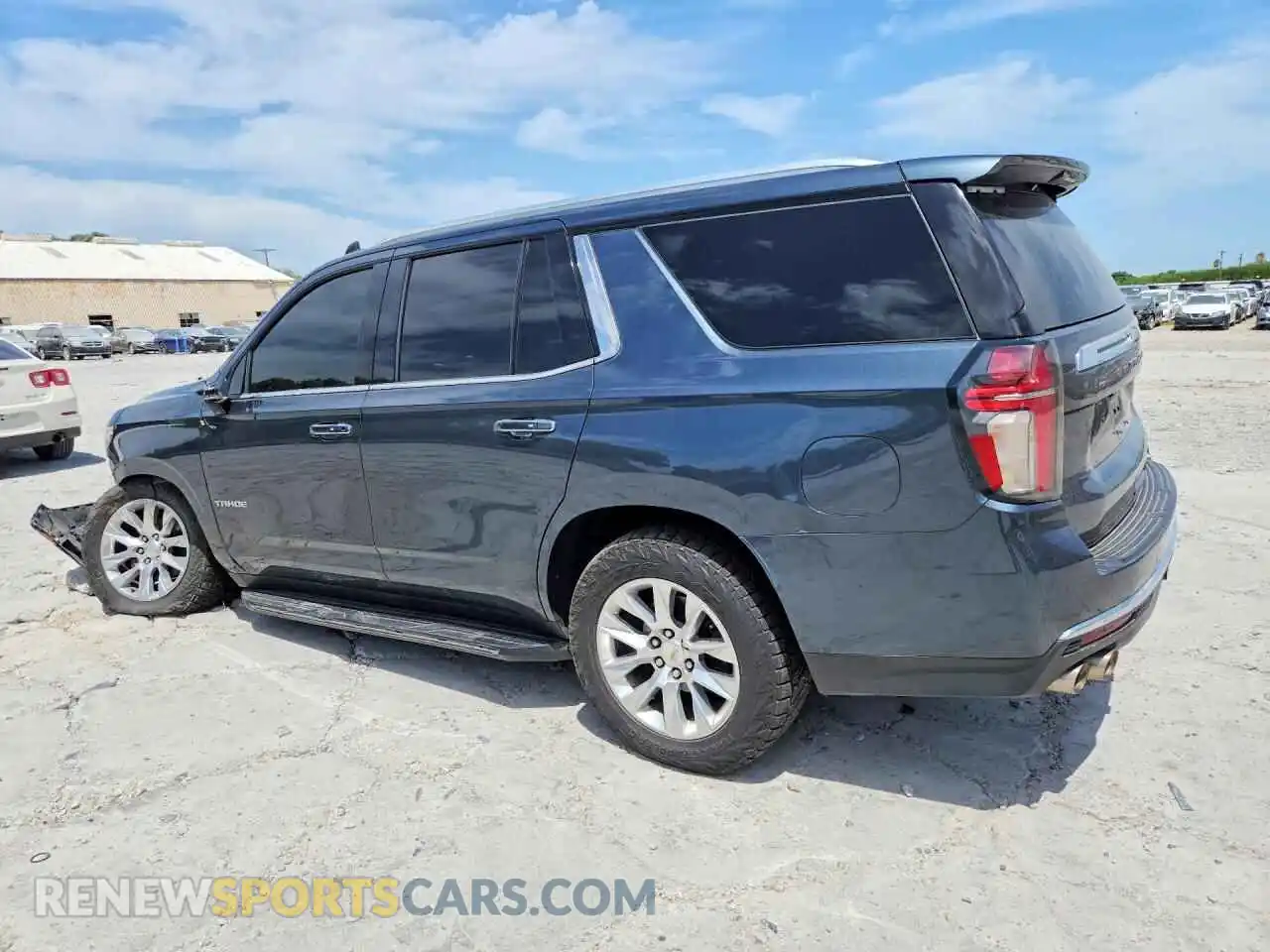 2 fotografías del automóvil dañado 1GNSCSKDXMR339448 CHEVROLET TAHOE 2021