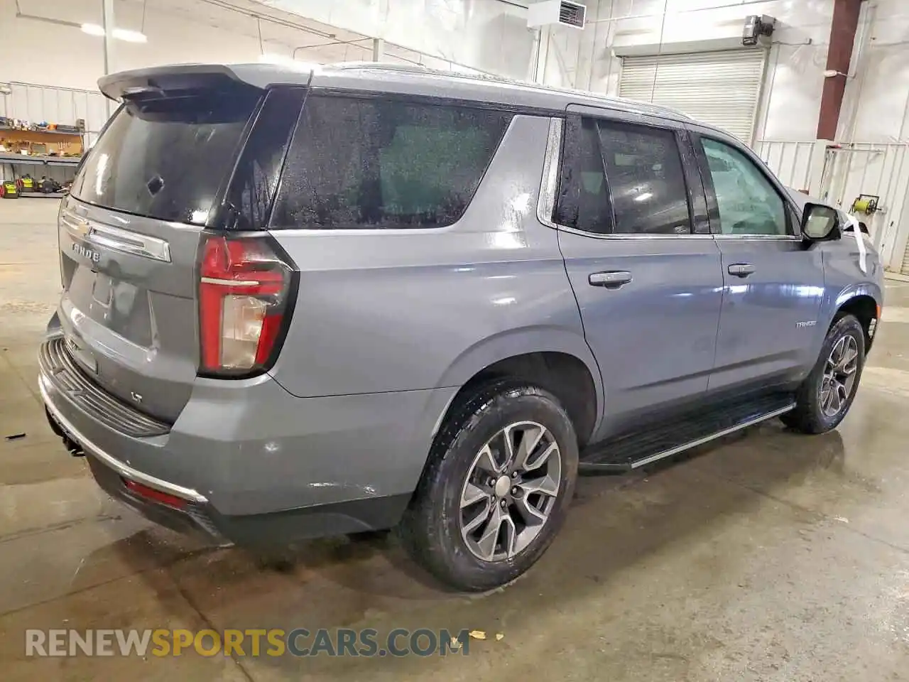 3 Photograph of a damaged car 1GNSKNKDXNR307475 CHEVROLET TAHOE 2022