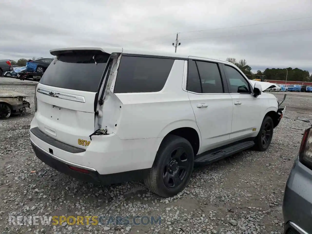 3 Photograph of a damaged car 1GNSCLED4PR429622 CHEVROLET TAHOE 2023
