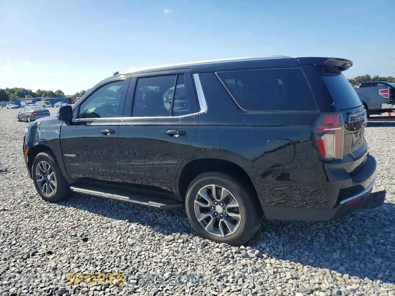 2 fotografías del automóvil dañado 1GNSCNKD2PR134261 CHEVROLET TAHOE 2023