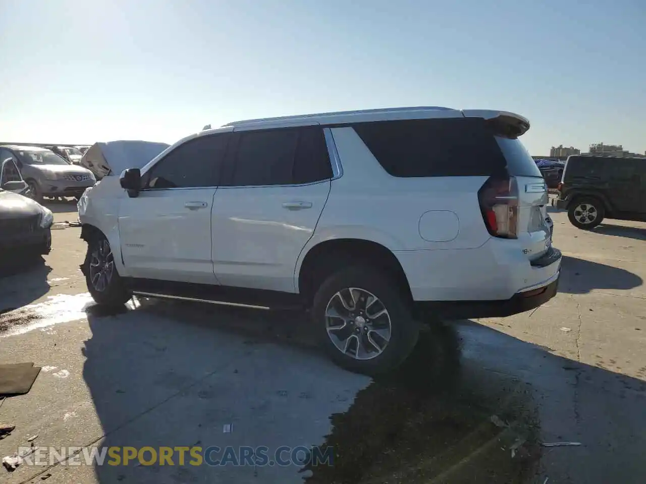 2 fotografías del automóvil dañado 1GNSCNKDXPR120348 CHEVROLET TAHOE 2023