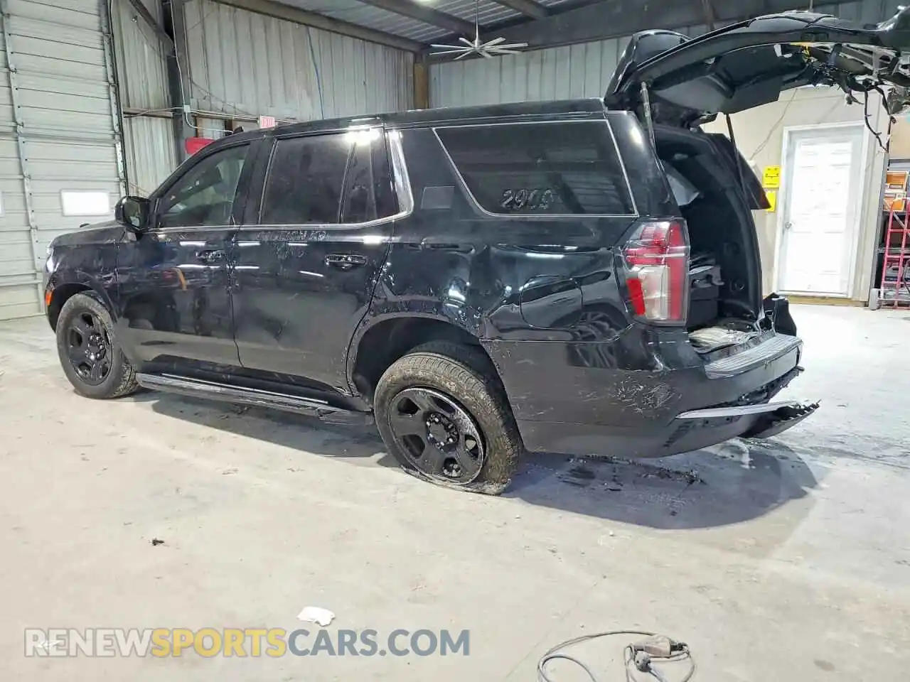 2 Photograph of a damaged car 1GNSKLED8PR472363 CHEVROLET TAHOE 2023