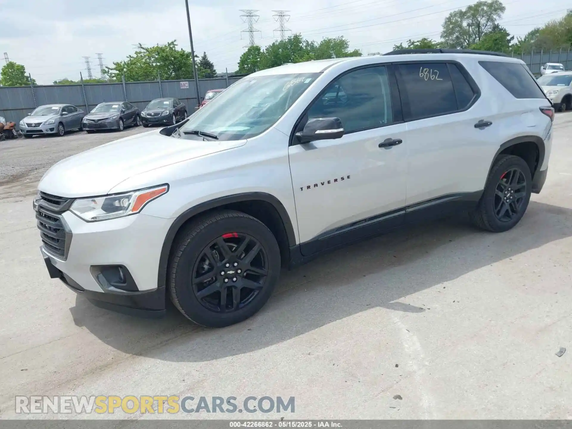 2 Photograph of a damaged car 1GNEVKKWXMJ159359 CHEVROLET TRAVERSE 2021