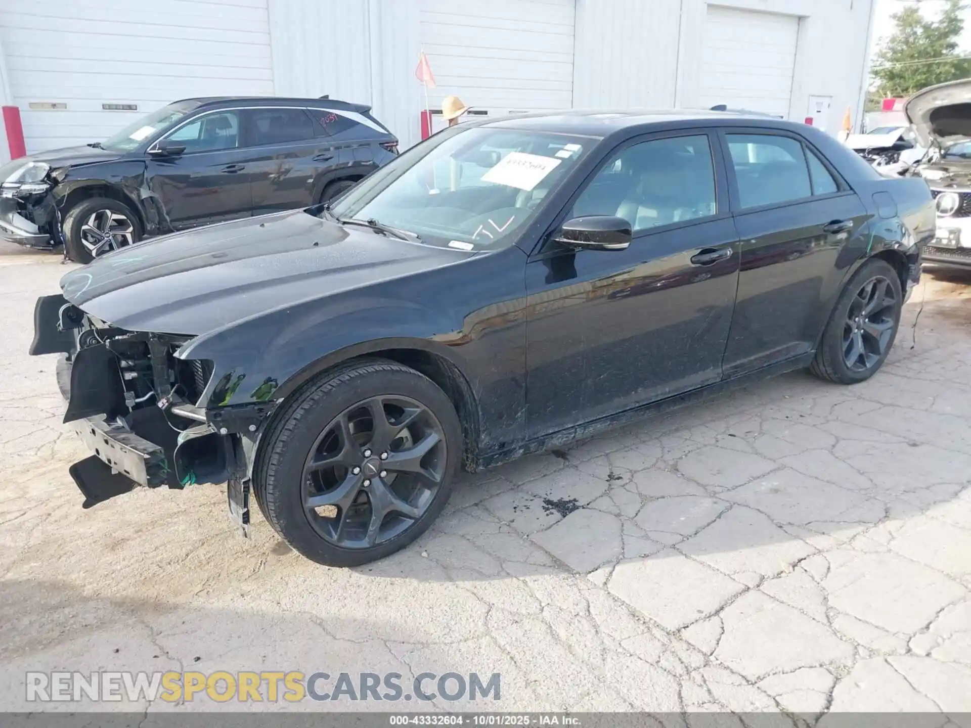 2 Photograph of a damaged car 2C3CCABG1PH616692 CHRYSLER 300 2023