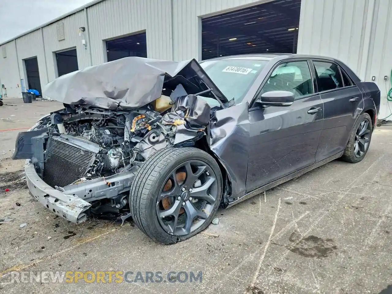 1 Photograph of a damaged car 2C3CCABG7PH565506 CHRYSLER 300 2023