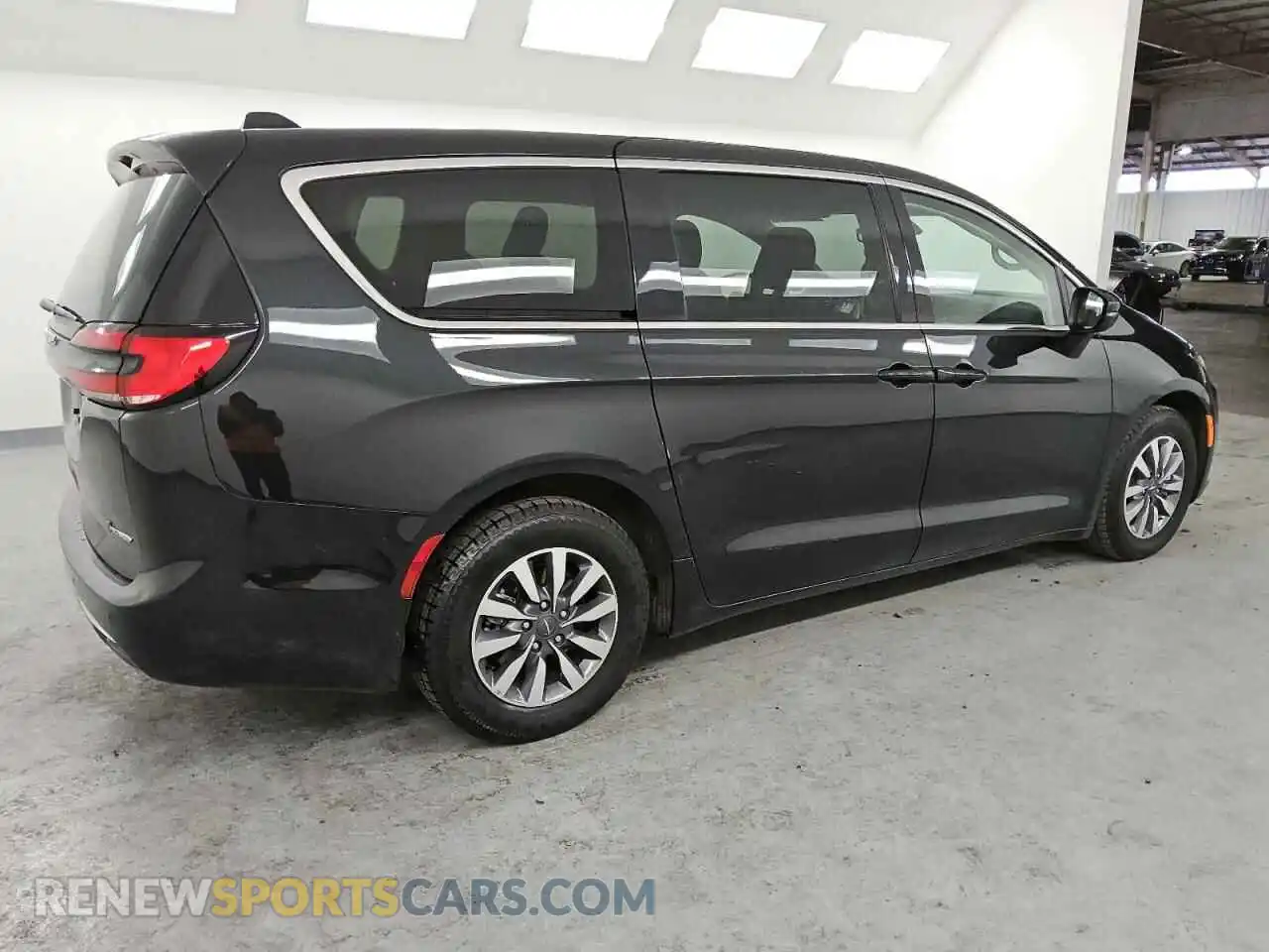 3 Photograph of a damaged car 2C4RC1L70PR631392 CHRYSLER PACIFICA 2023