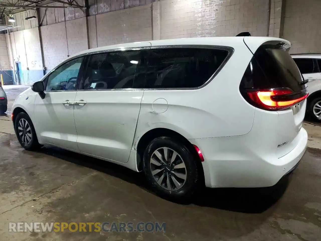 2 Photograph of a damaged car 2C4RC1L72PR562270 CHRYSLER PACIFICA 2023
