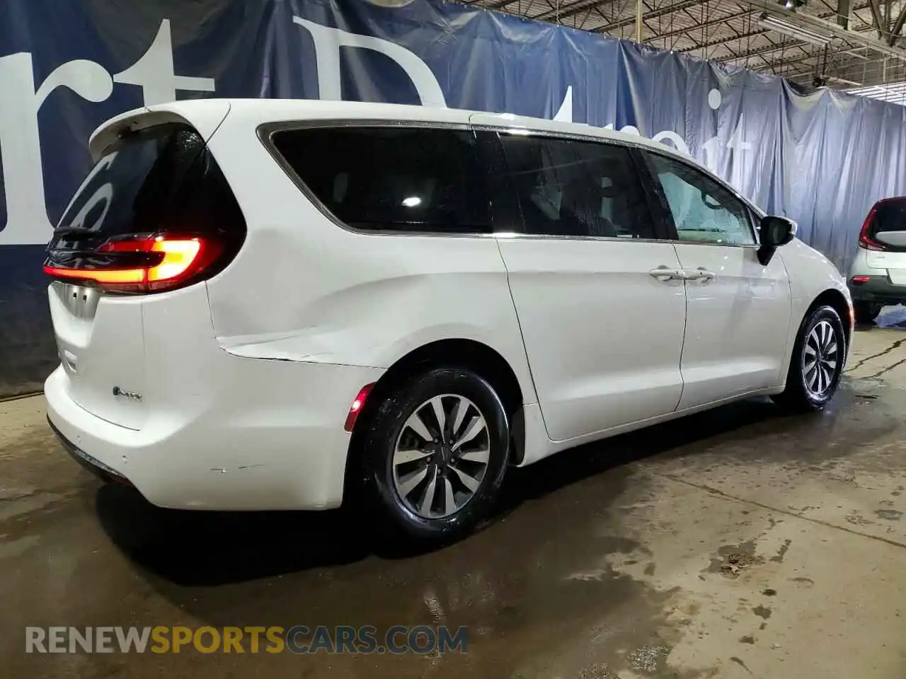 3 Photograph of a damaged car 2C4RC1L72PR562270 CHRYSLER PACIFICA 2023