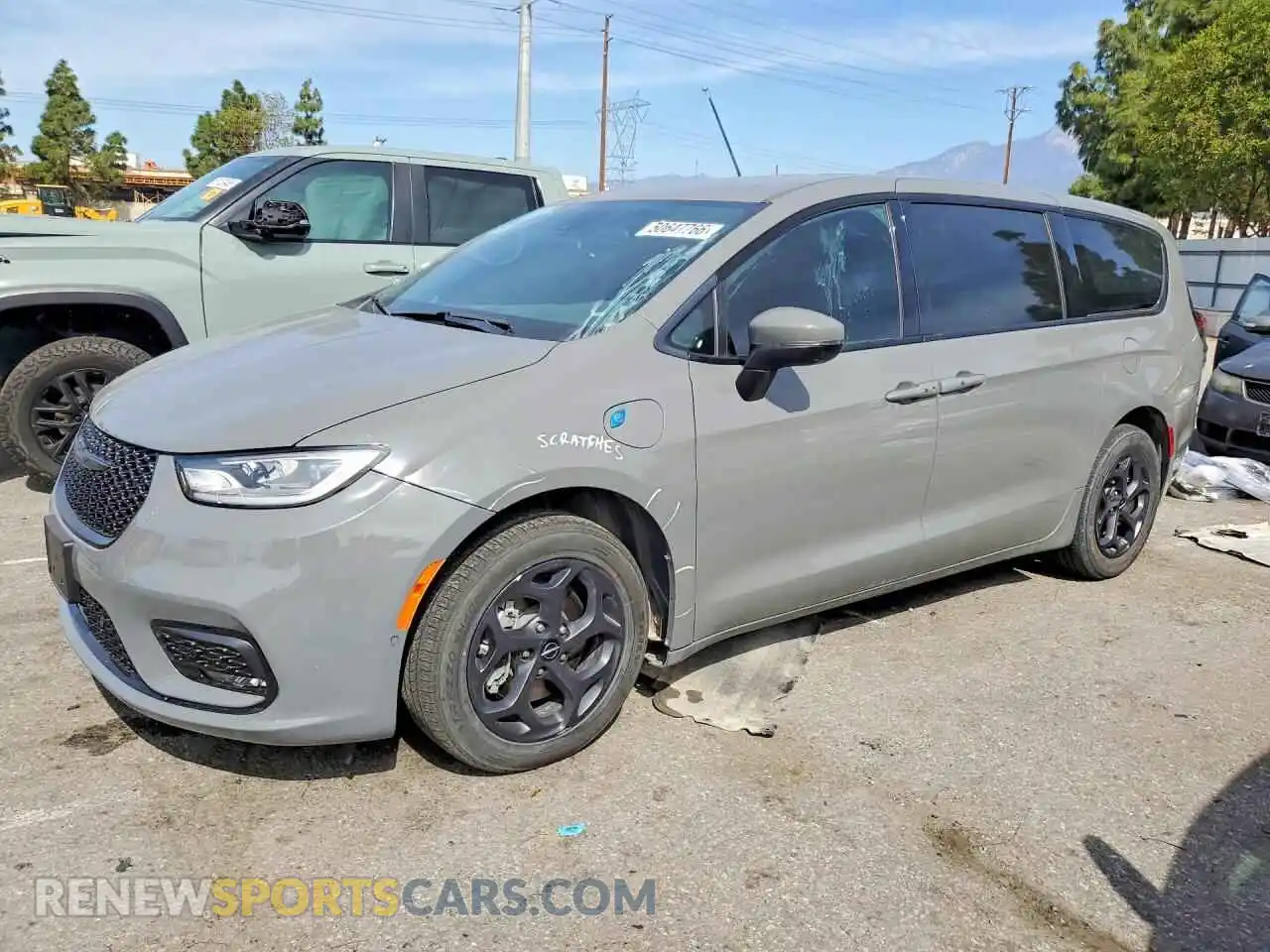 1 Photograph of a damaged car 2C4RC1L74PR543512 CHRYSLER PACIFICA 2023
