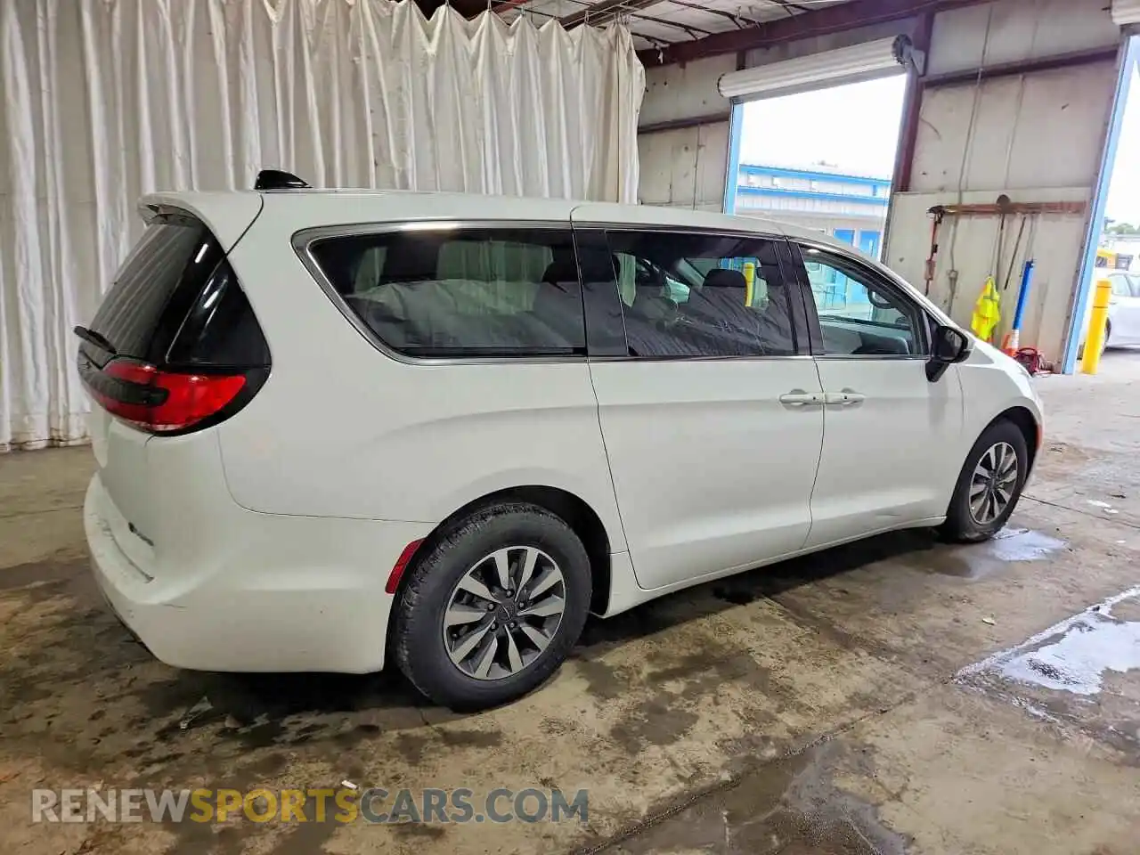 3 Photograph of a damaged car 2C4RC1L74PR599112 CHRYSLER PACIFICA 2023