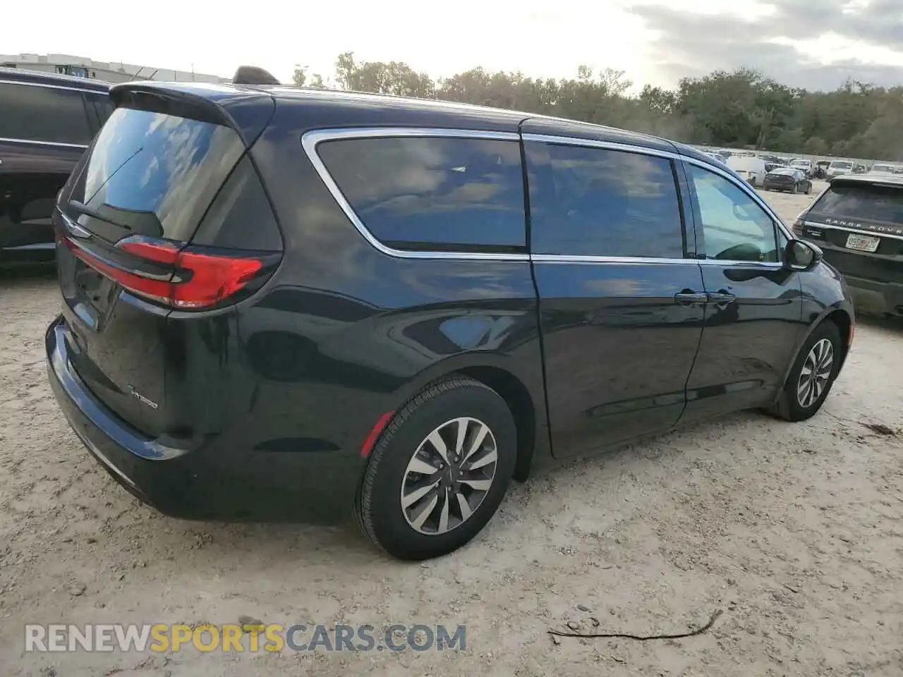 3 Photograph of a damaged car 2C4RC1L77PR584166 CHRYSLER PACIFICA 2023