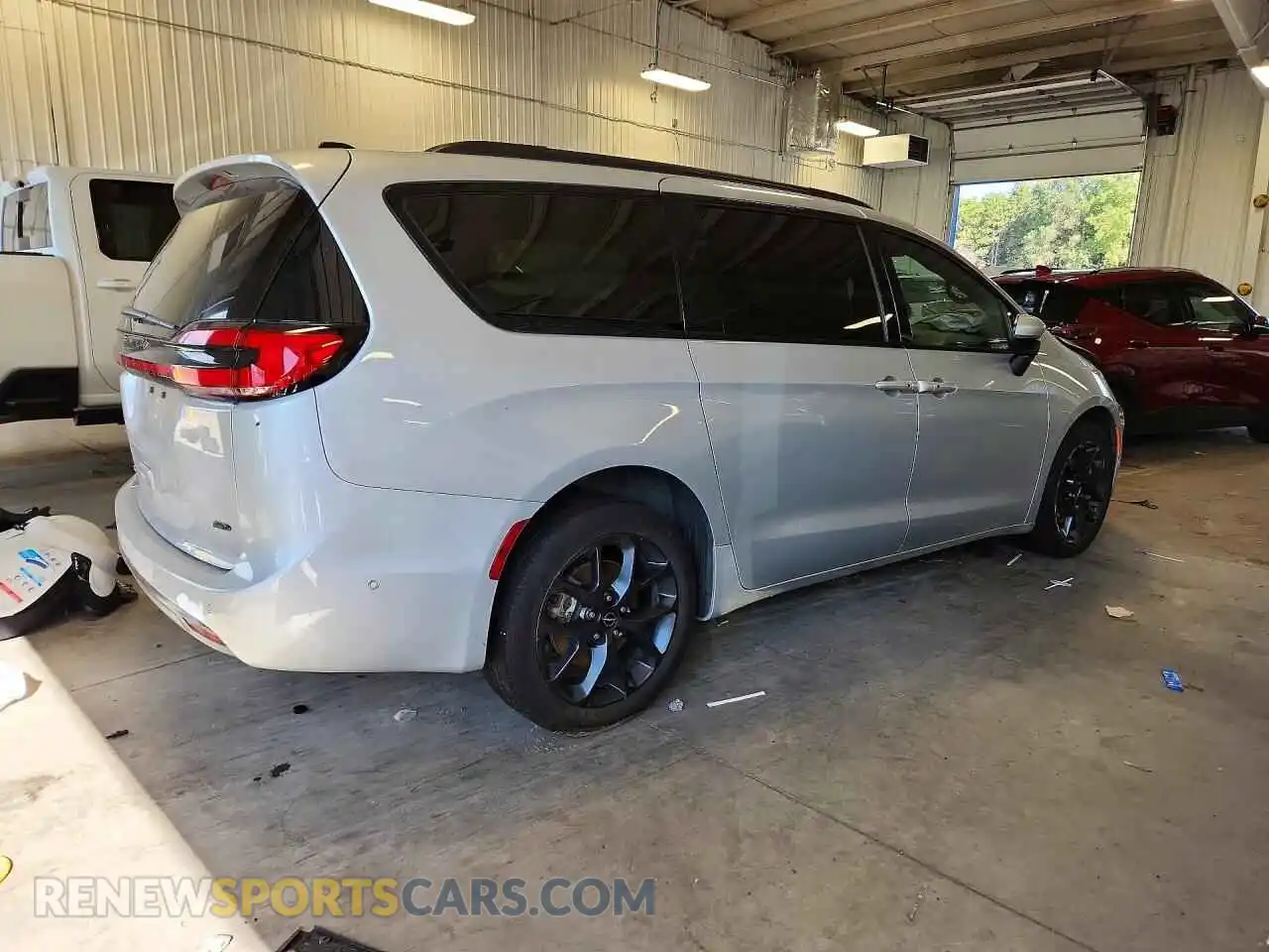 3 Фотография поврежденного автомобиля 2C4RC3BG9PR545284 CHRYSLER PACIFICA 2023