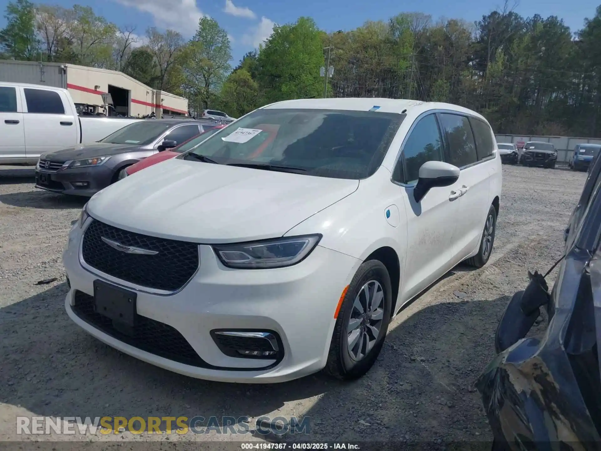 2 Photograph of a damaged car 2C4RC1L79PR595055 CHRYSLER PACIFICA HYBRID 2023