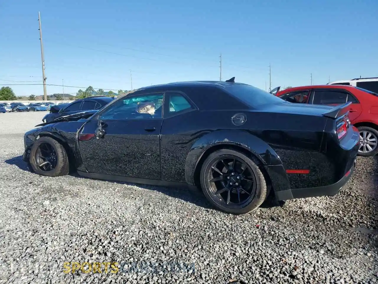 2 Photograph of a damaged car 2C3CDZC99PH520434 DODGE CHALLENGER 2023