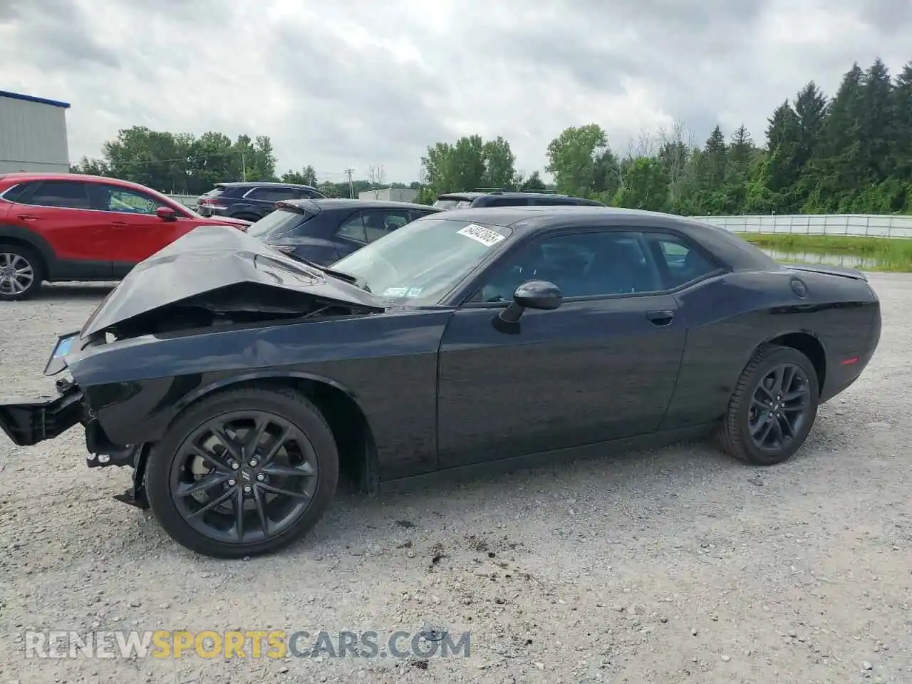 1 Photograph of a damaged car 2C3CDZKG0PH696921 DODGE CHALLENGER 2023