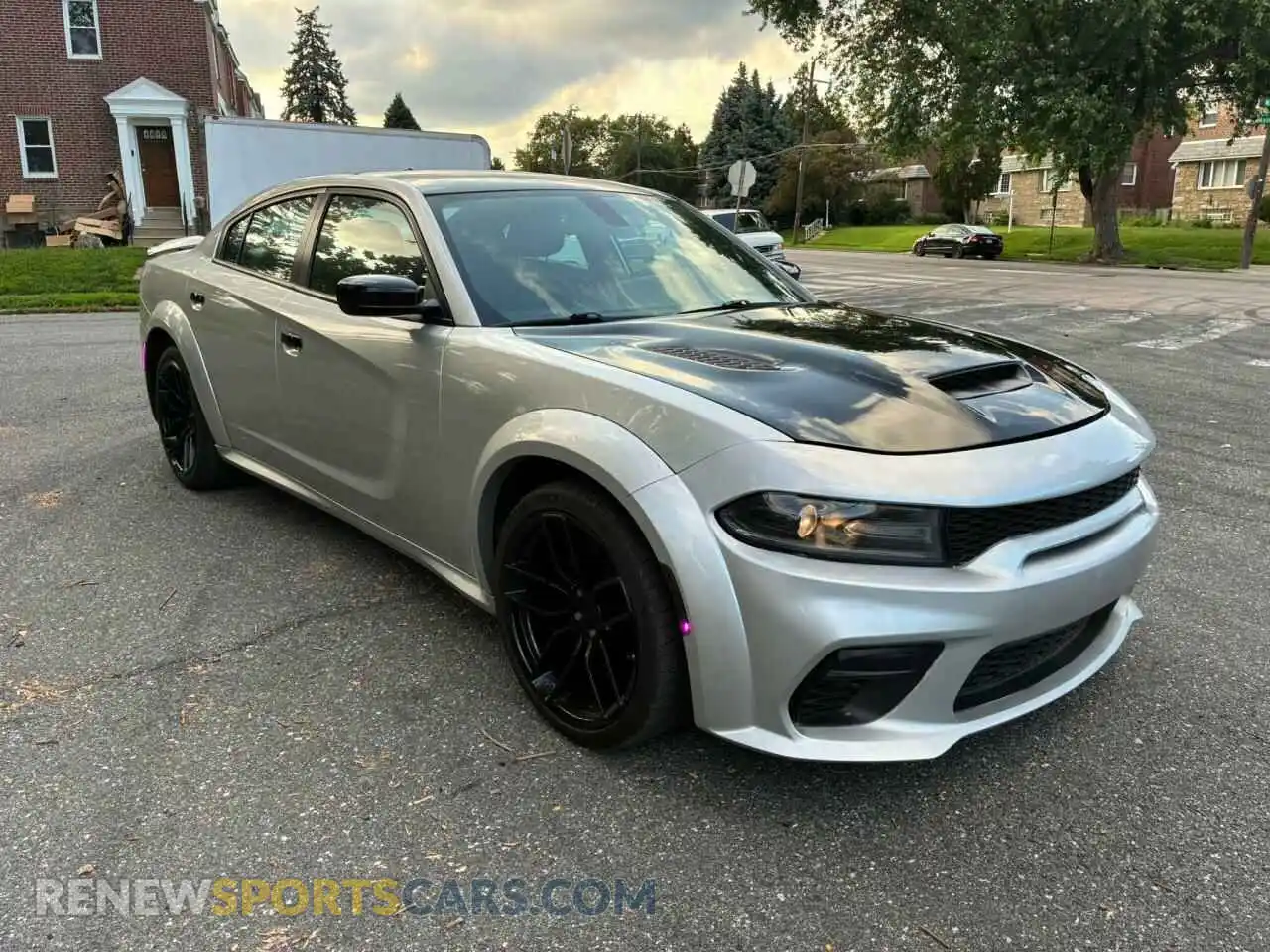 1 Photograph of a damaged car 2C3CDXAT5MH556927 DODGE CHARGER 2021
