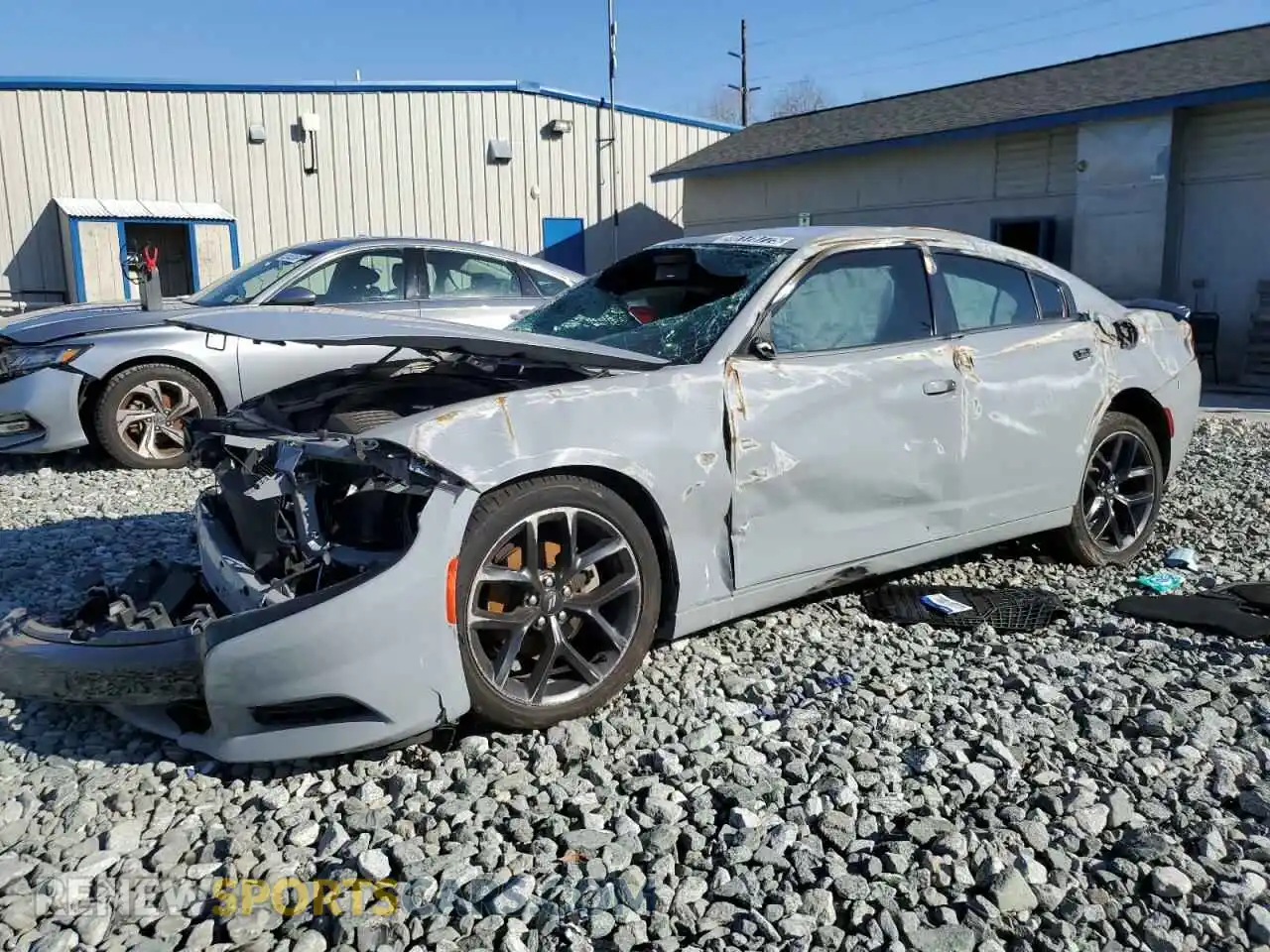 2 Photograph of a damaged car 2C3CDXBG0MH682579 DODGE CHARGER 2021