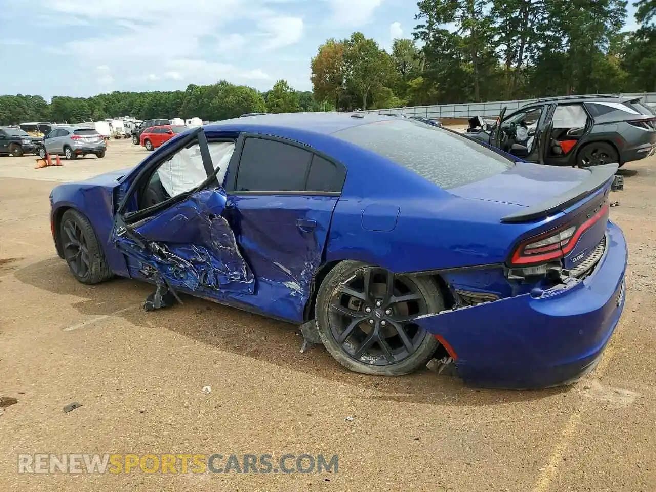 2 fotografías del automóvil dañado 2C3CDXBG4NH138863 DODGE CHARGER 2022