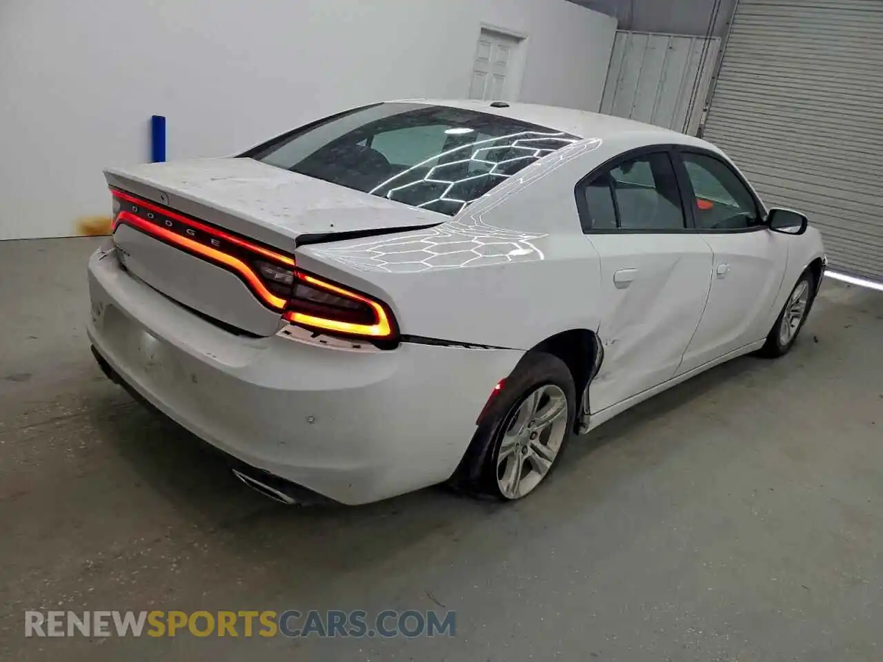 3 Photograph of a damaged car 2C3CDXBG8NH258861 DODGE CHARGER 2022