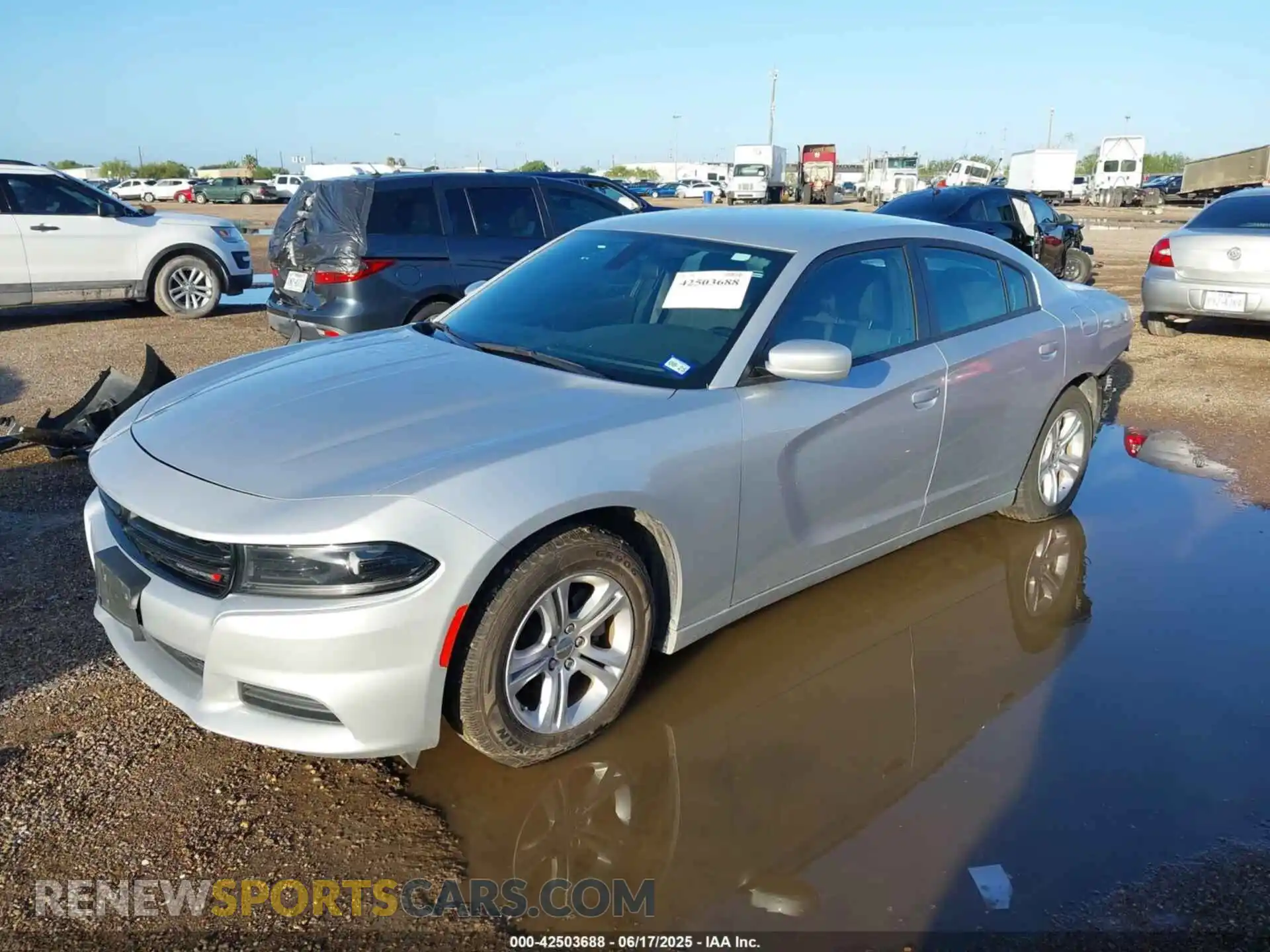2 fotografías del automóvil dañado 2C3CDXBG9NH250526 DODGE CHARGER 2022