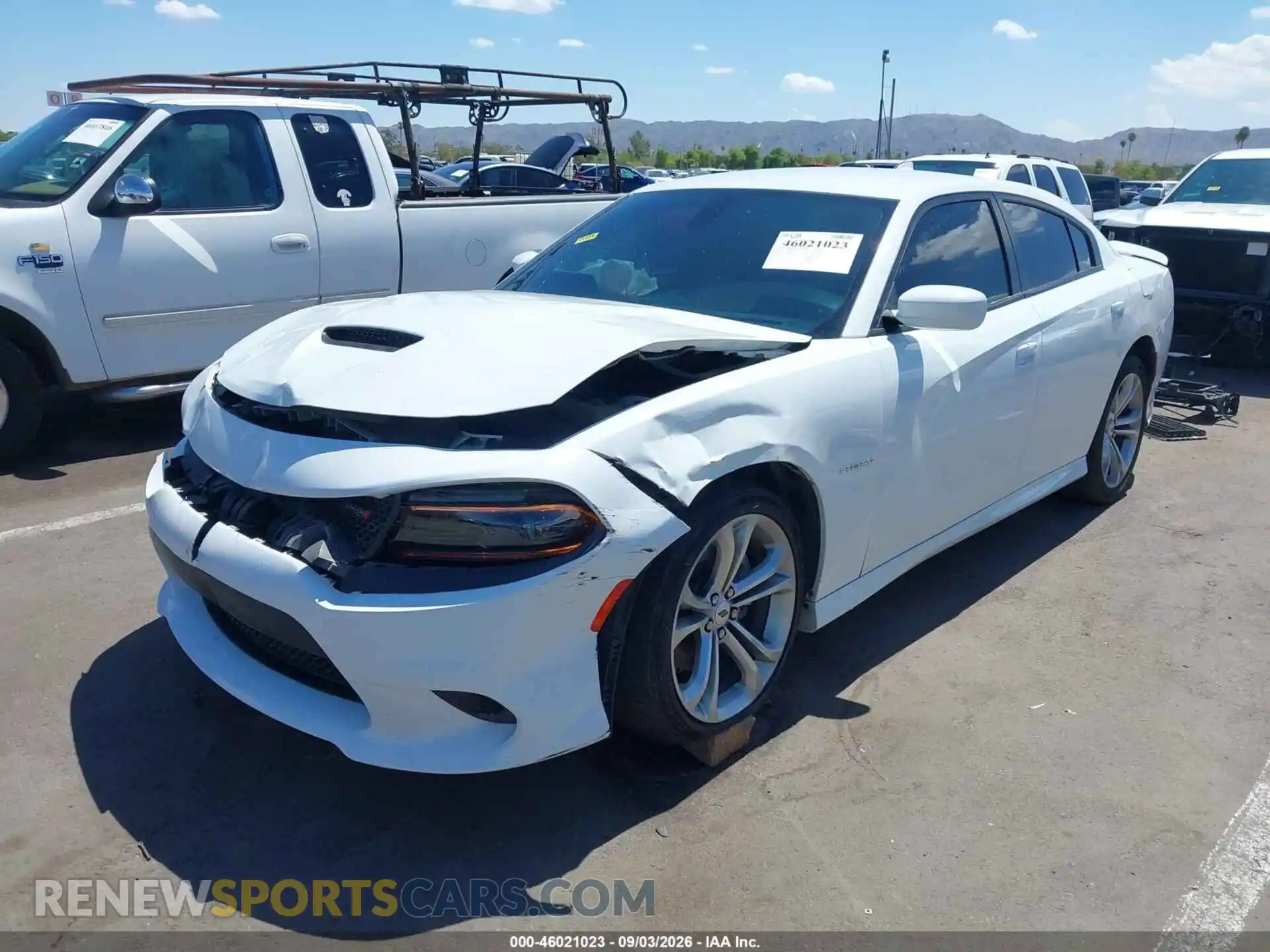 2 fotografías del automóvil dañado 2C3CDXCT7NH259222 DODGE CHARGER 2022