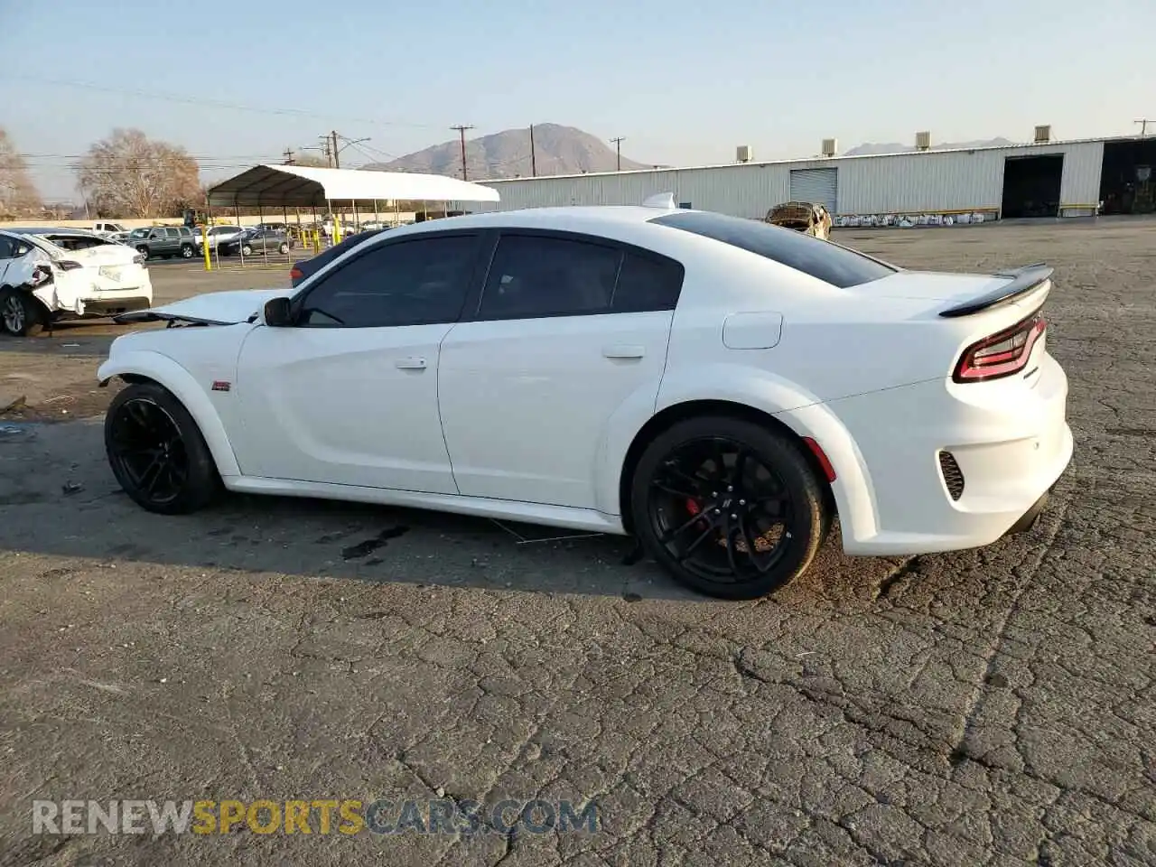 2 Photograph of a damaged car 2C3CDXGJ4NH107018 DODGE CHARGER 2022