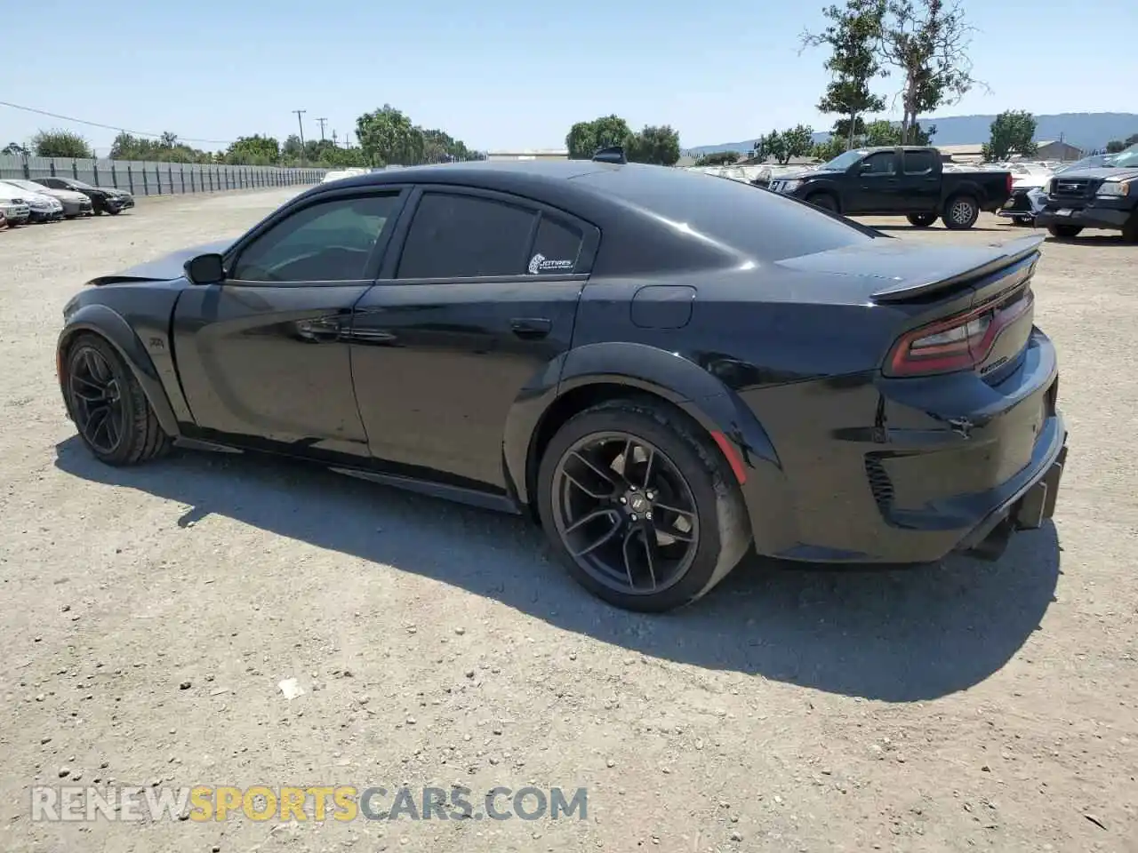 2 Photograph of a damaged car 2C3CDXGJ4NH218345 DODGE CHARGER 2022