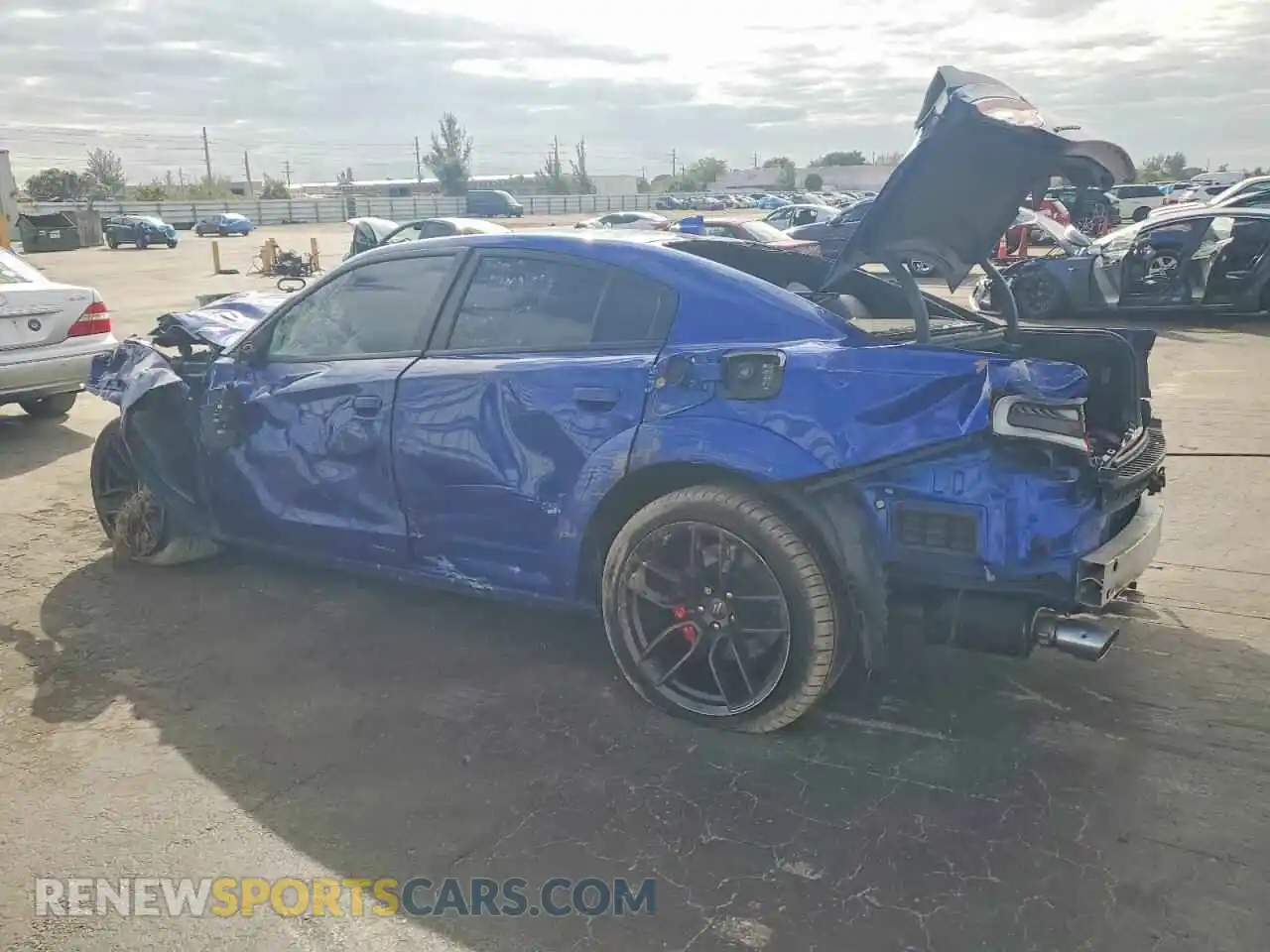 2 fotografías del automóvil dañado 2C3CDXGJ9NH210533 DODGE CHARGER 2022