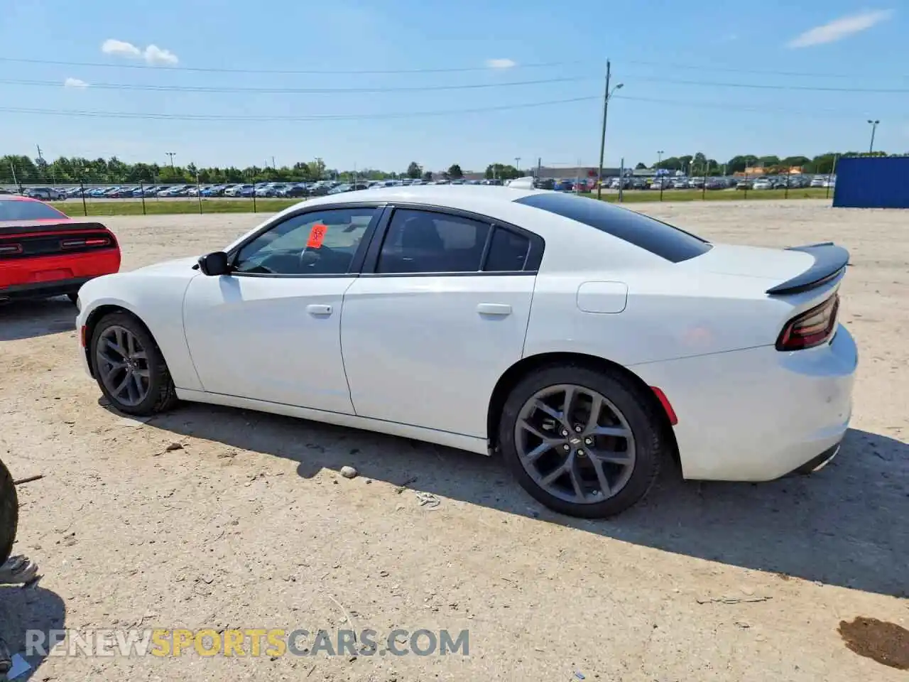 2 fotografías del automóvil dañado 2C3CDXBG0PH519239 DODGE CHARGER 2023