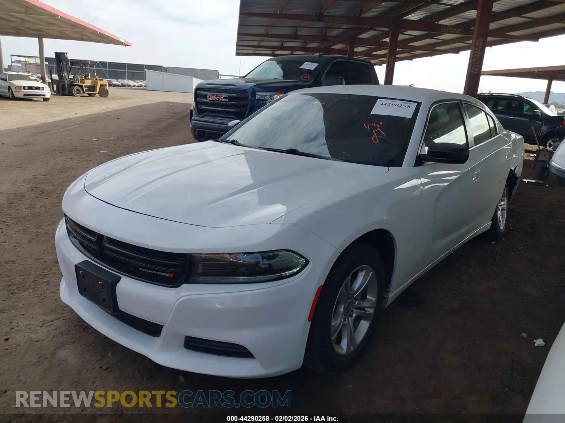 2 fotografías del automóvil dañado 2C3CDXBG3PH569178 DODGE CHARGER 2023