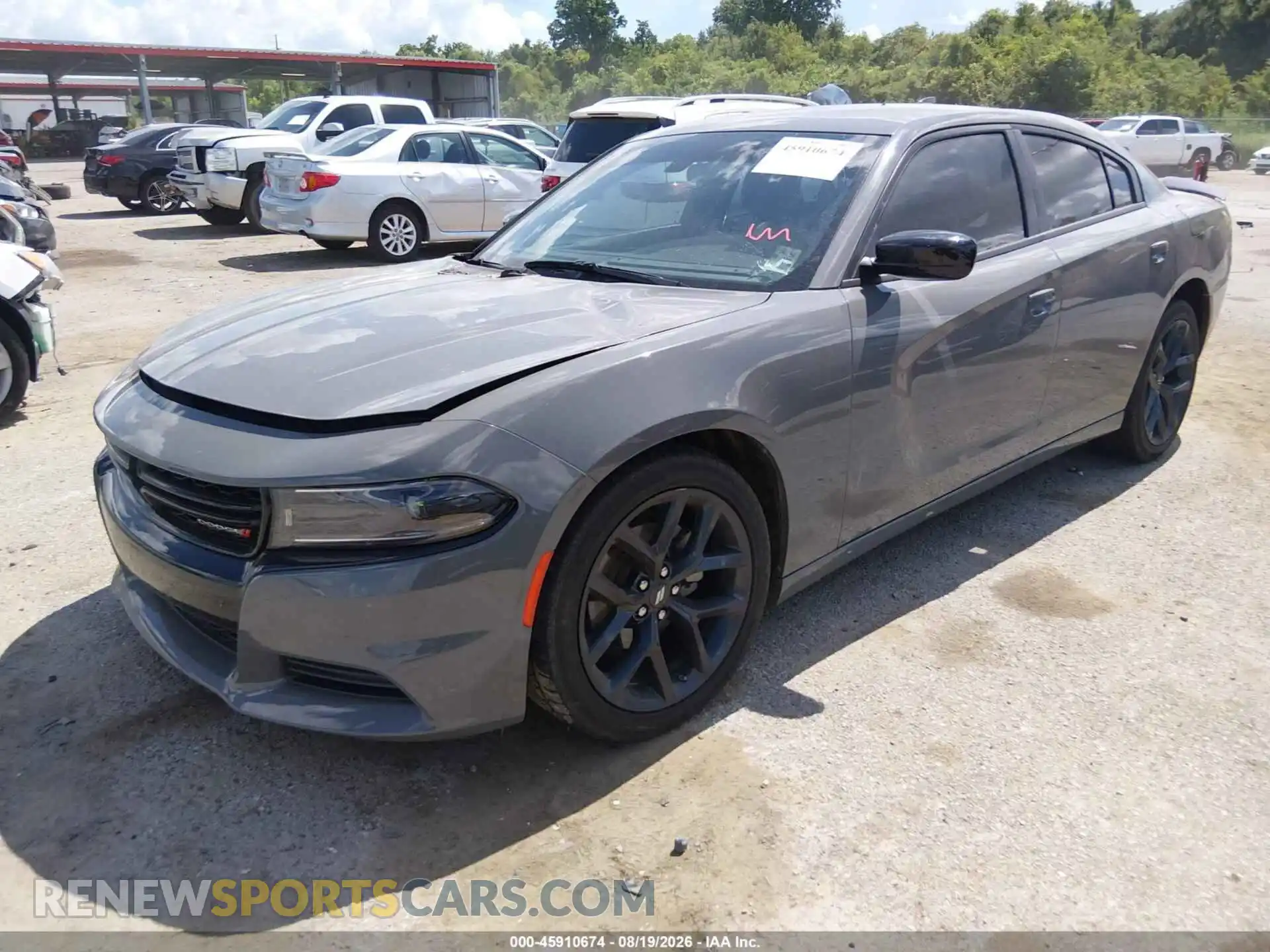 2 fotografías del automóvil dañado 2C3CDXBG4PH612362 DODGE CHARGER 2023