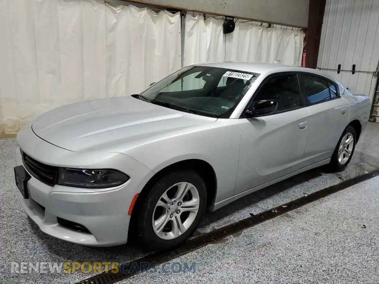 1 Photograph of a damaged car 2C3CDXBG6PH559440 DODGE CHARGER 2023