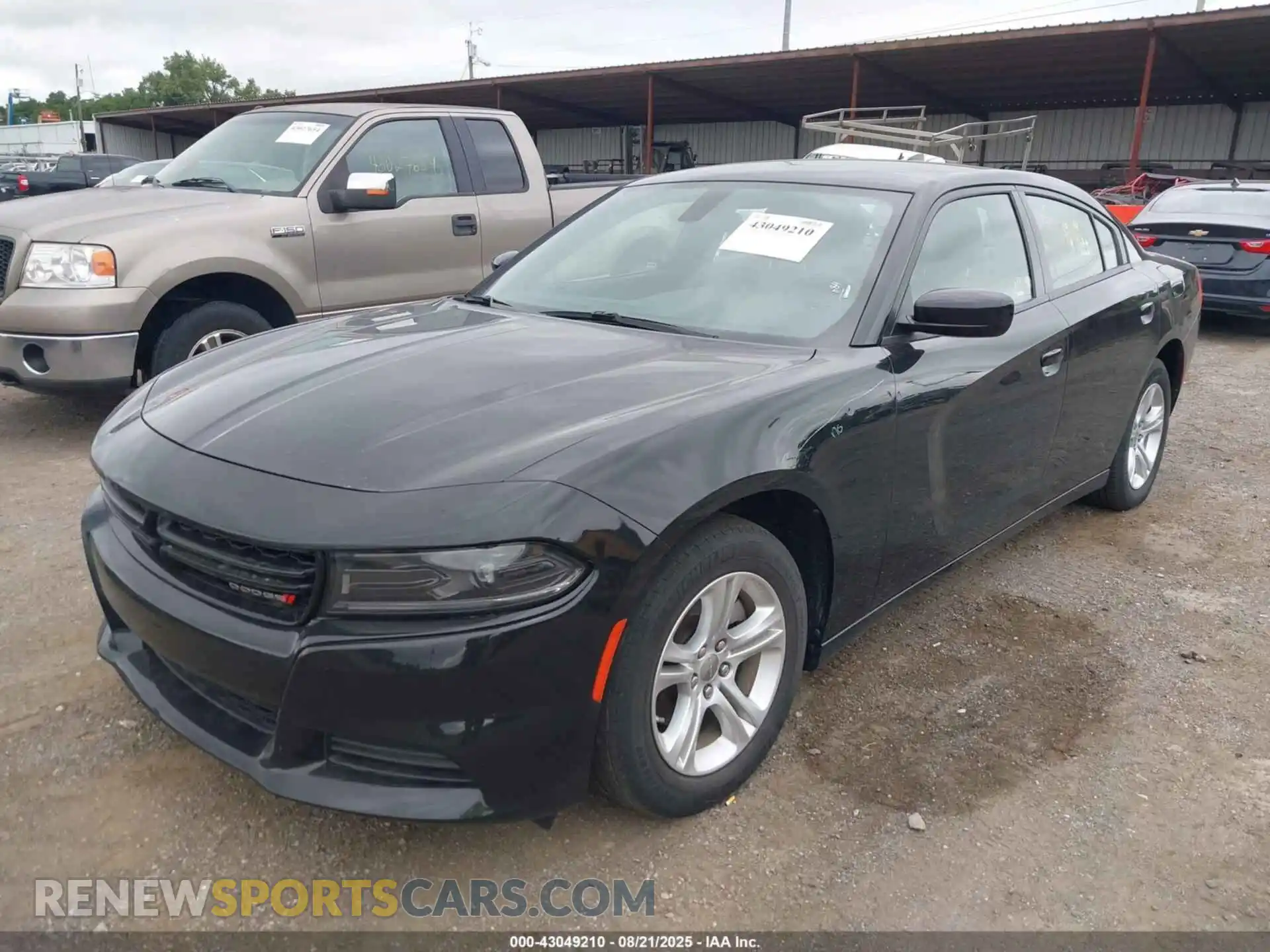 2 Photograph of a damaged car 2C3CDXBG6PH559678 DODGE CHARGER 2023