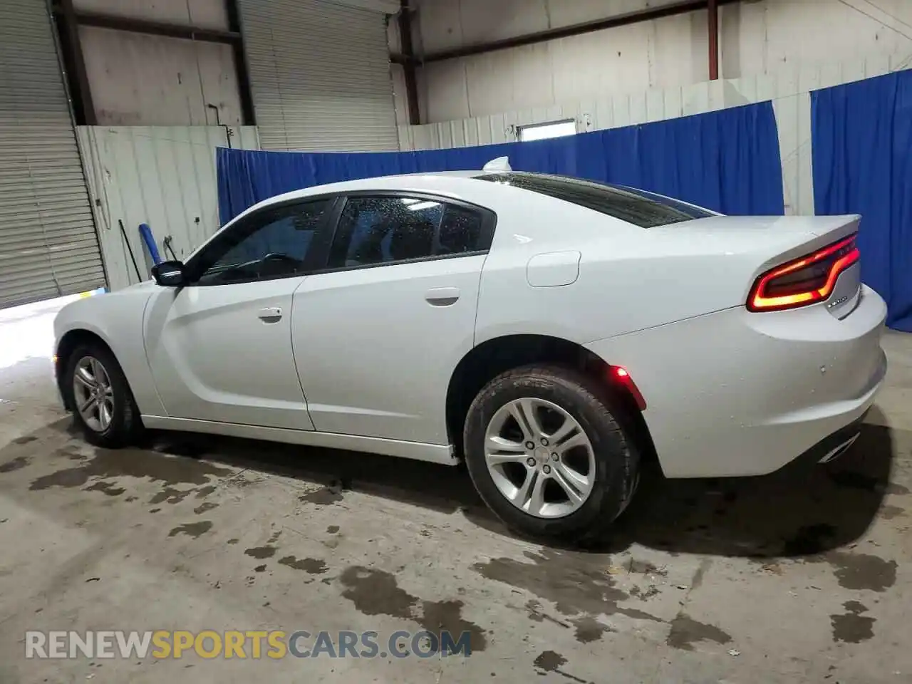 2 Photograph of a damaged car 2C3CDXBG6PH579641 DODGE CHARGER 2023