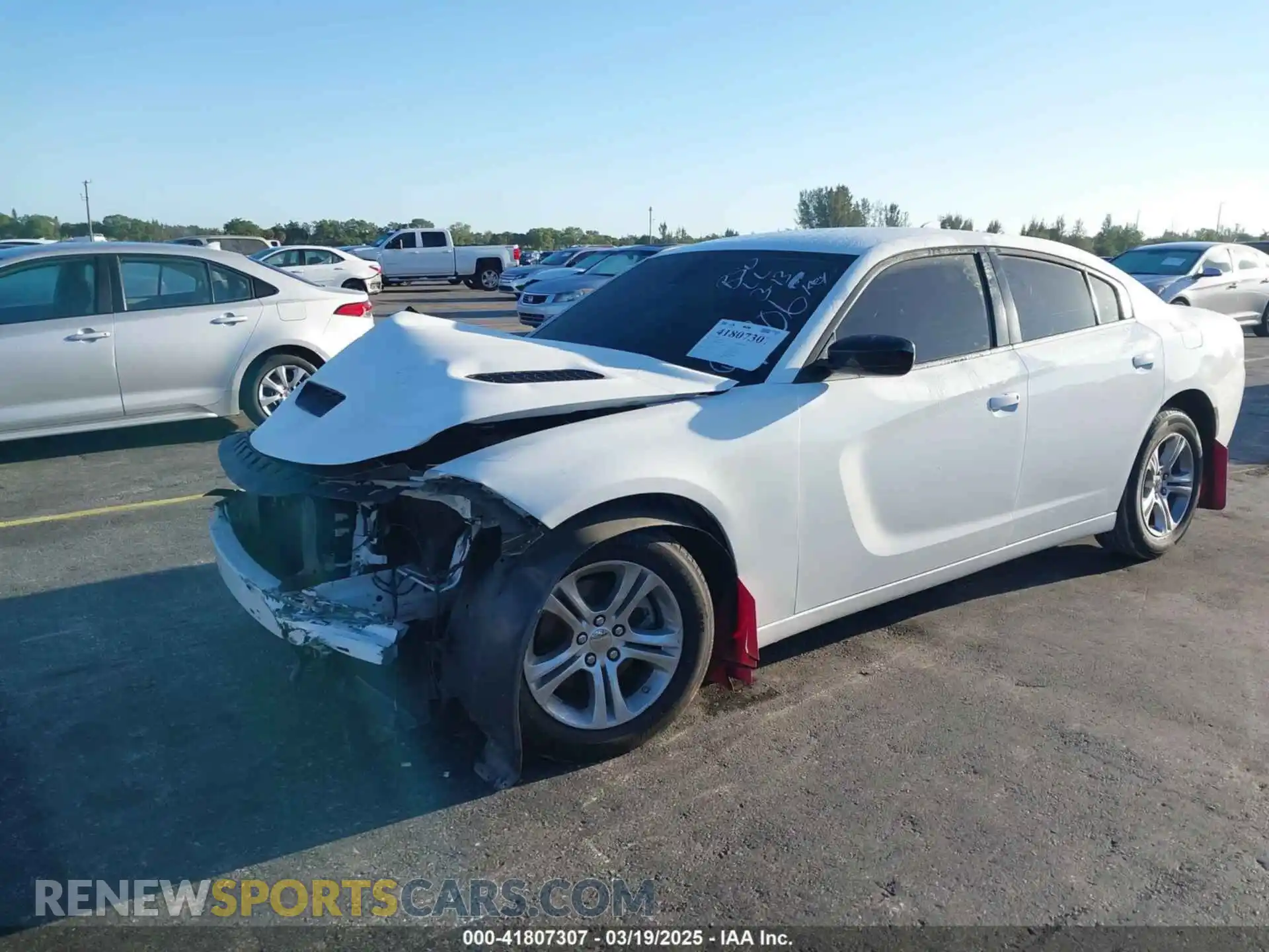 2 Photograph of a damaged car 2C3CDXBG8PH579706 DODGE CHARGER 2023