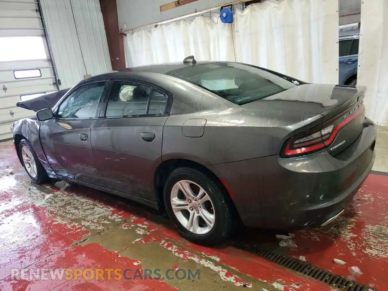 2 Photograph of a damaged car 2C3CDXBG9PH531258 DODGE CHARGER 2023