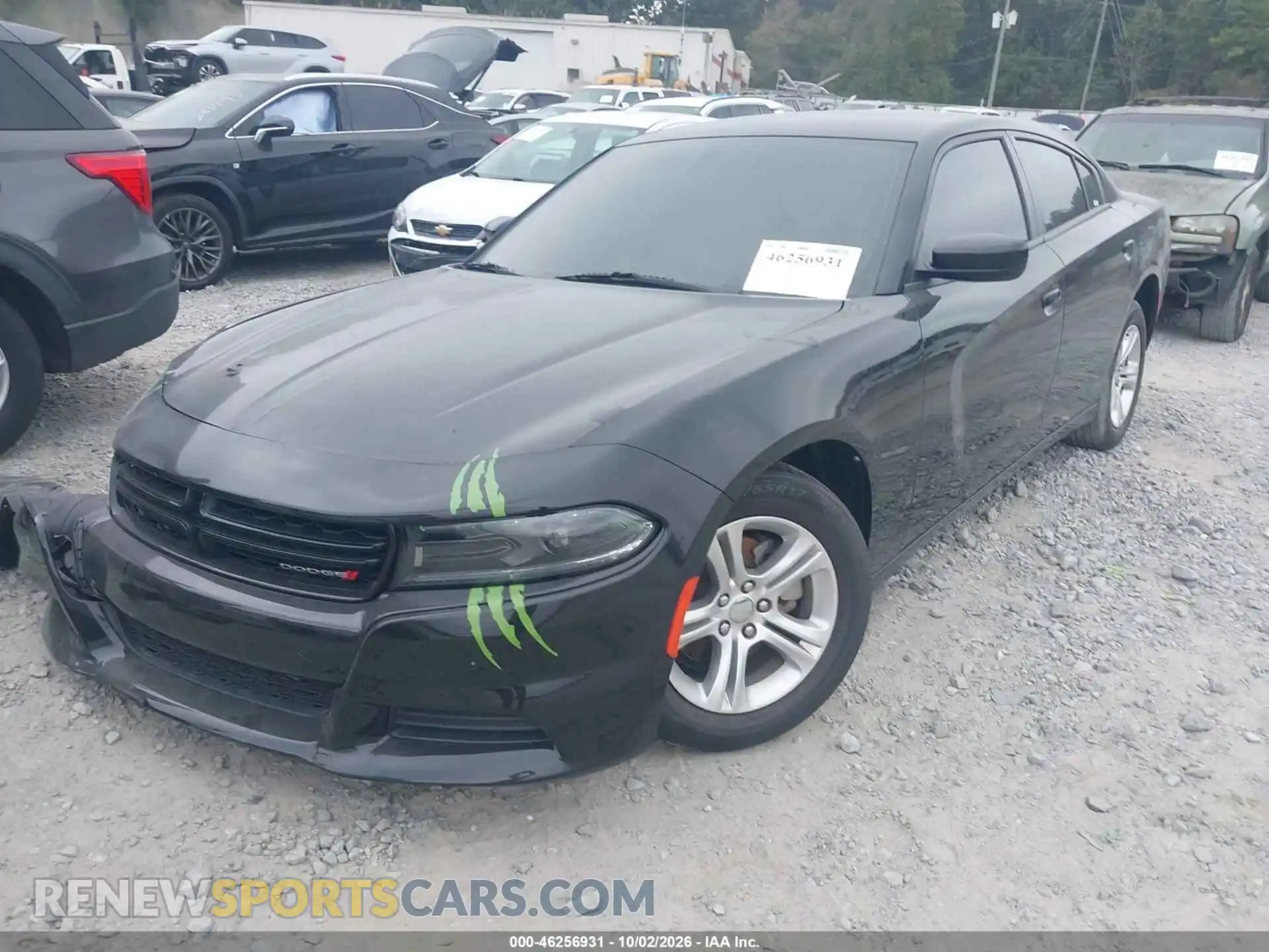 2 fotografías del automóvil dañado 2C3CDXBG9PH687865 DODGE CHARGER 2023
