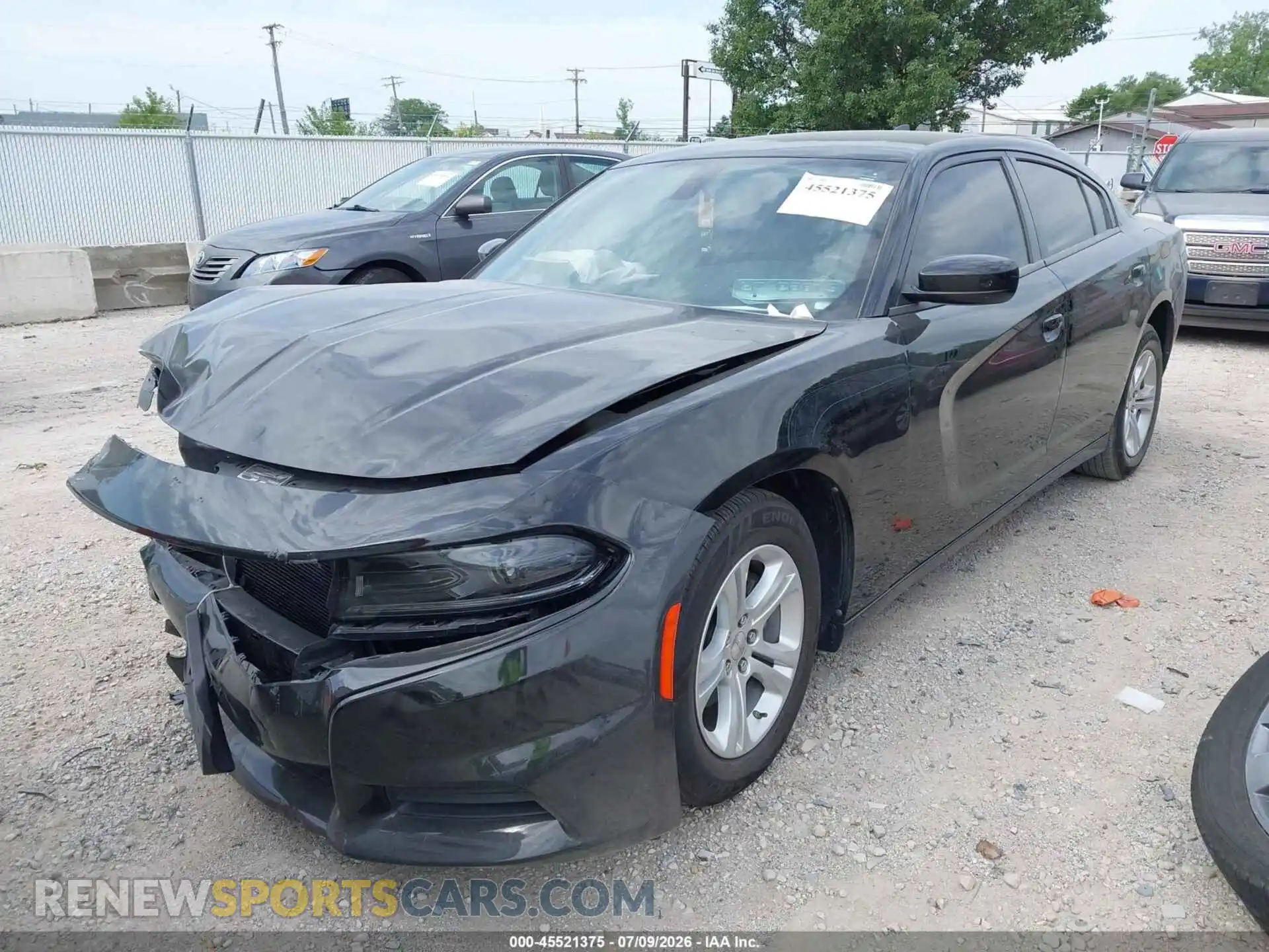2 fotografías del automóvil dañado 2C3CDXBGXPH531236 DODGE CHARGER 2023