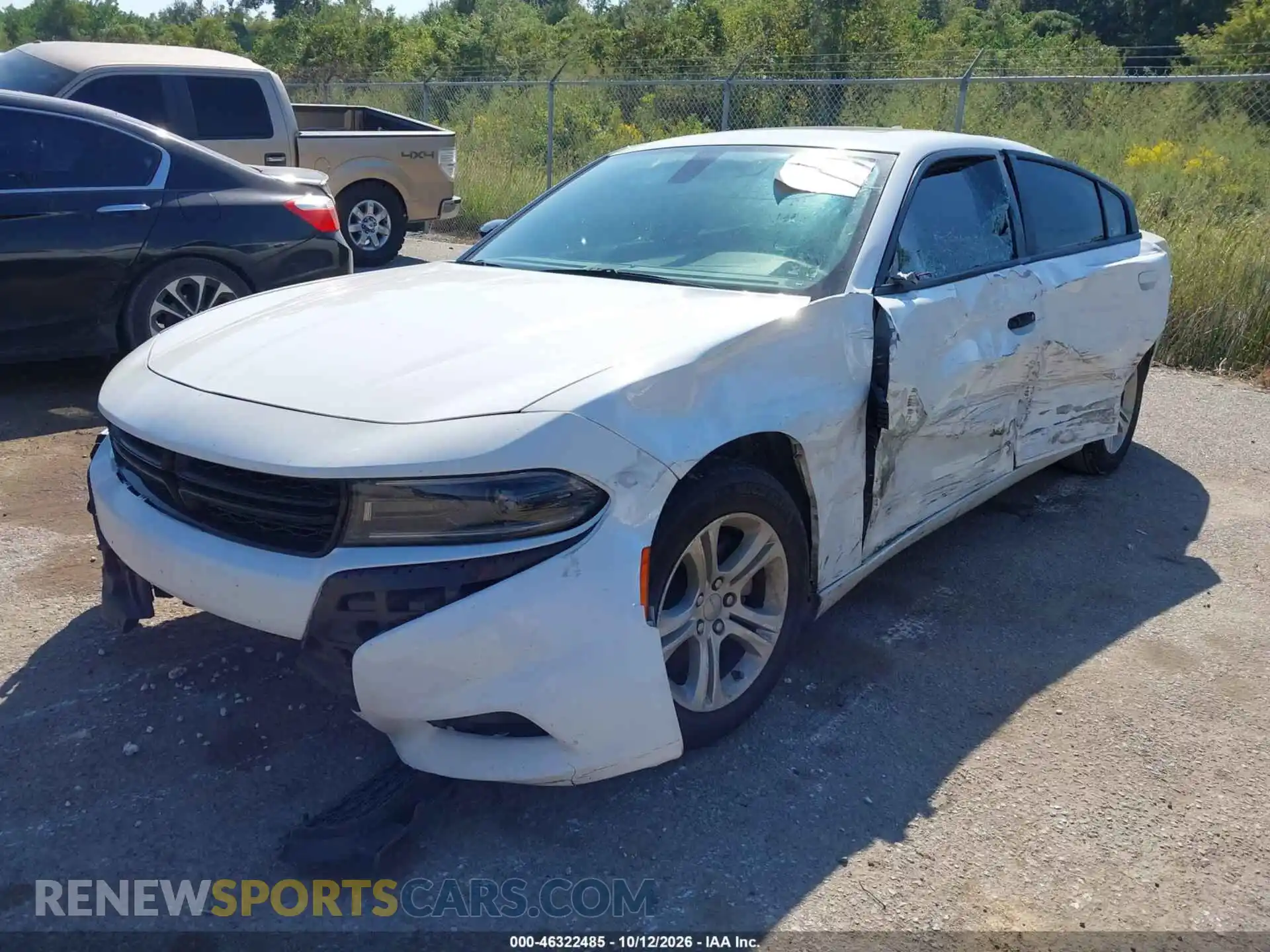 2 fotografías del automóvil dañado 2C3CDXBGXPH655717 DODGE CHARGER 2023